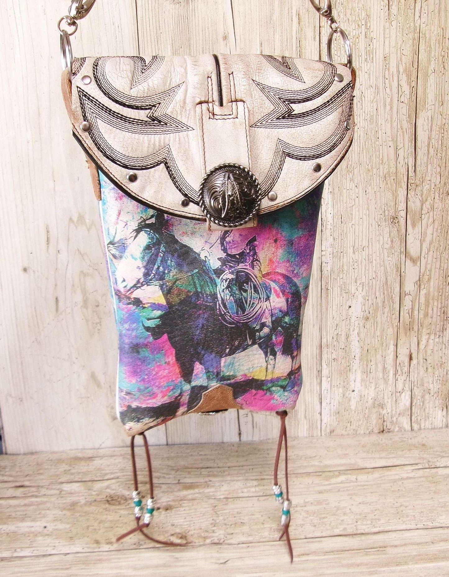 Cowboy Boot Crossbody Hipster Bag HP1135 handcrafted from cowboy boots. Shop Handbags at ChrisThompsonBags.com and buy the best ["Crossbody","feathers","fringe","Hipster","Small"] at Chris Thompson Bags.