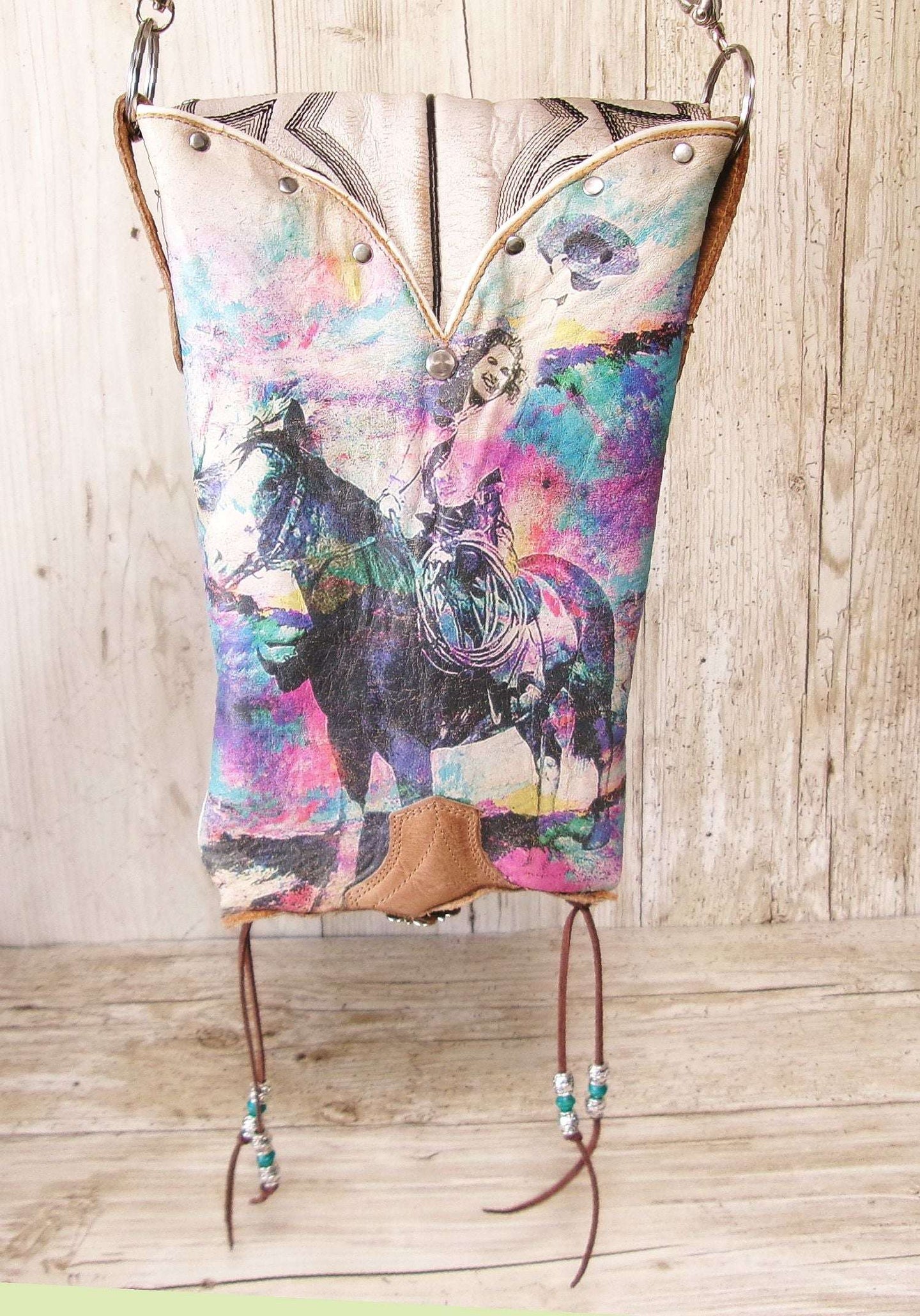 Cowboy Boot Crossbody Hipster Bag HP1135 handcrafted from cowboy boots. Shop Handbags at ChrisThompsonBags.com and buy the best ["Crossbody","feathers","fringe","Hipster","Small"] at Chris Thompson Bags.