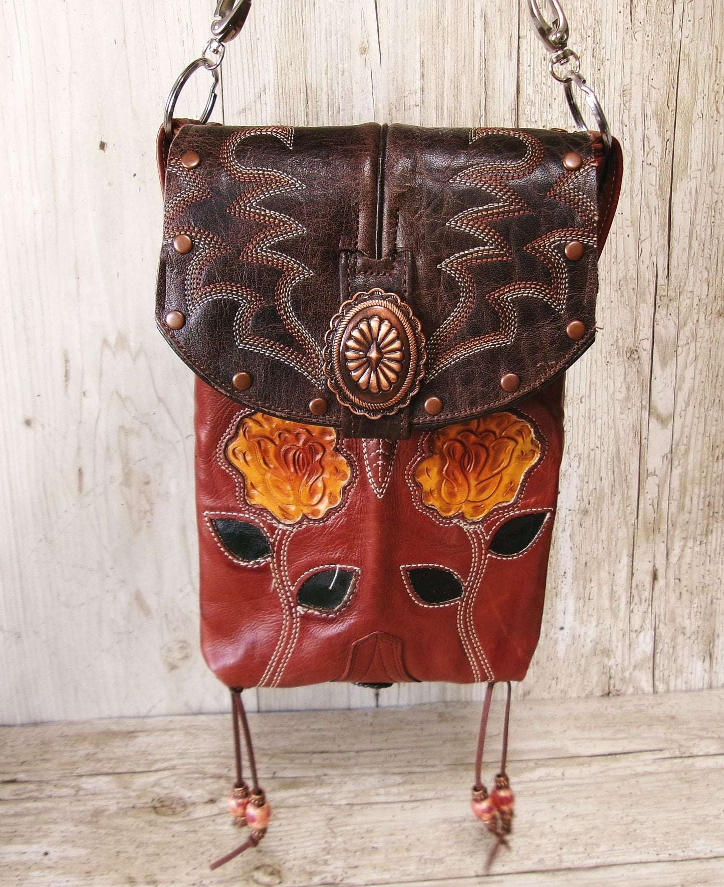Cowboy Boot Crossbody Hipster Bag HP1136 handcrafted from cowboy boots. Shop Handbags at ChrisThompsonBags.com and buy the best ["Crossbody","floral","fringe","Hipster","Small"] at Chris Thompson Bags.