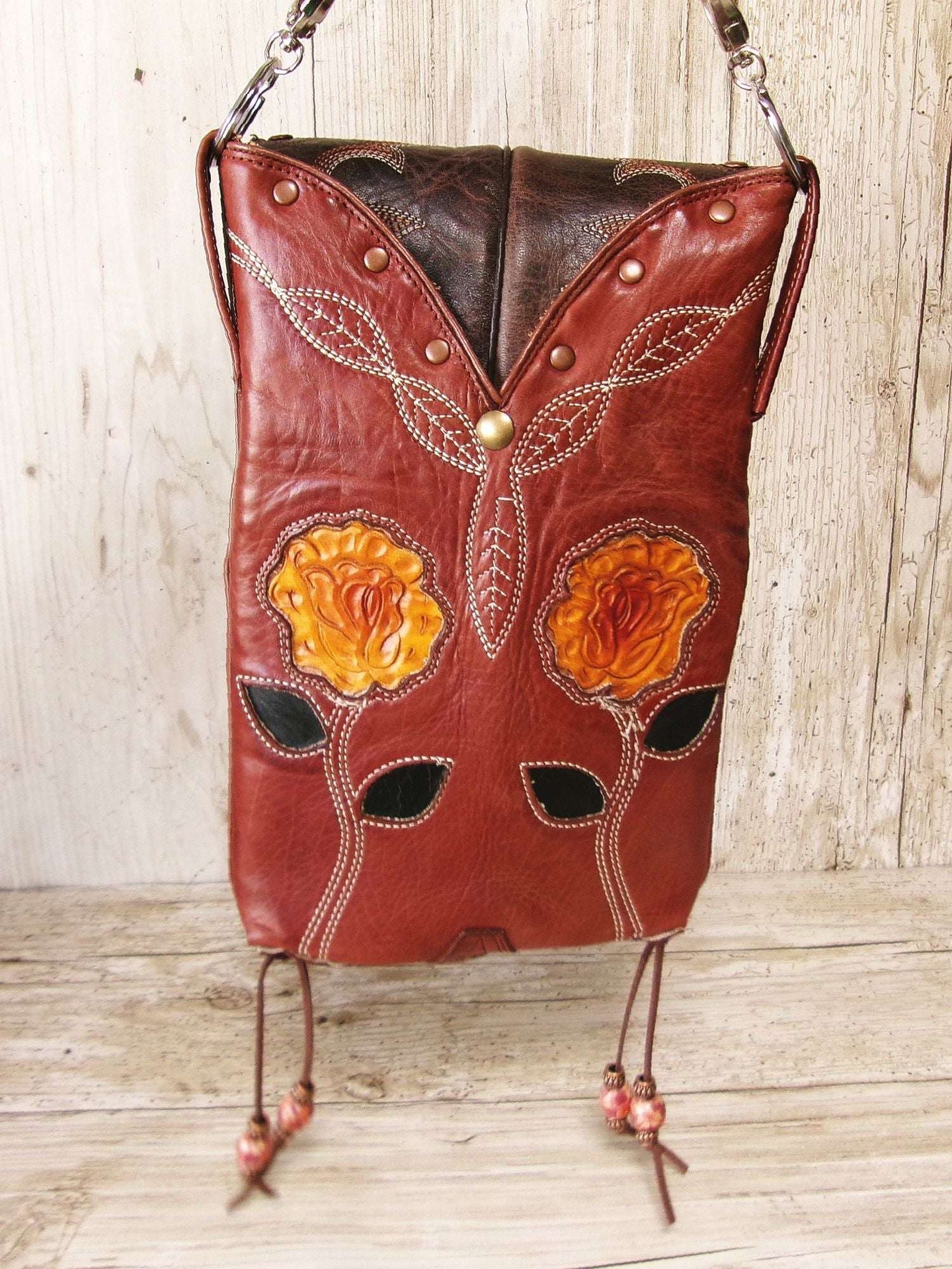 Cowboy Boot Crossbody Hipster Bag HP1136 handcrafted from cowboy boots. Shop Handbags at ChrisThompsonBags.com and buy the best ["Crossbody","floral","fringe","Hipster","Small"] at Chris Thompson Bags.