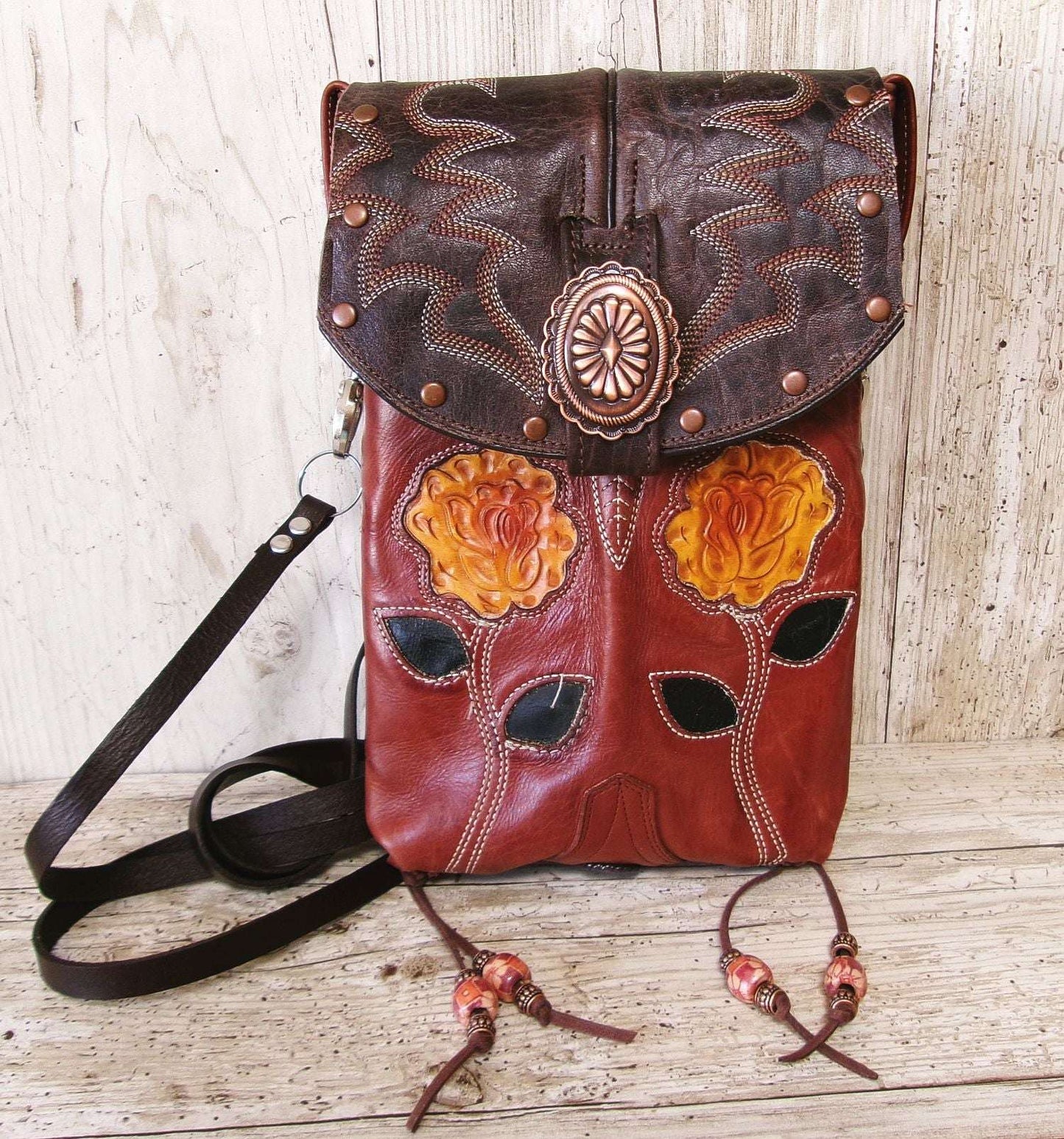 Cowboy Boot Crossbody Hipster Bag HP1136 handcrafted from cowboy boots. Shop Handbags at ChrisThompsonBags.com and buy the best ["Crossbody","floral","fringe","Hipster","Small"] at Chris Thompson Bags.