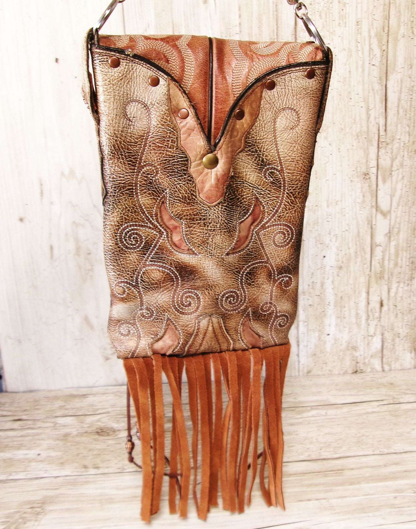Cowboy Boot Crossbody Hipster Bag with Fringe HP1138 handcrafted from cowboy boots. Shop Handbags at ChrisThompsonBags.com and buy the best ["Crossbody","feathers","fringe","Hipster","horses","Small"] at Chris Thompson Bags.
