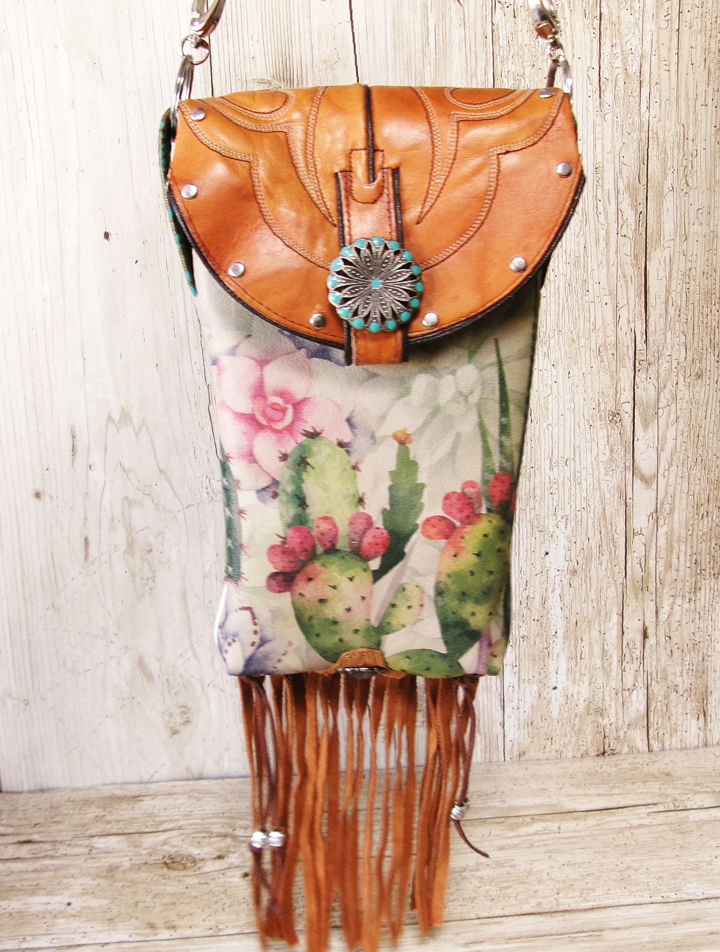 Cowboy Boot Crossbody Hipster Bag with Fringe HP1139 handcrafted from cowboy boots. Shop Handbags at ChrisThompsonBags.com and buy the best ["cactus","Crossbody","fringe","Hipster","Small","Turquoise"] at Chris Thompson Bags.