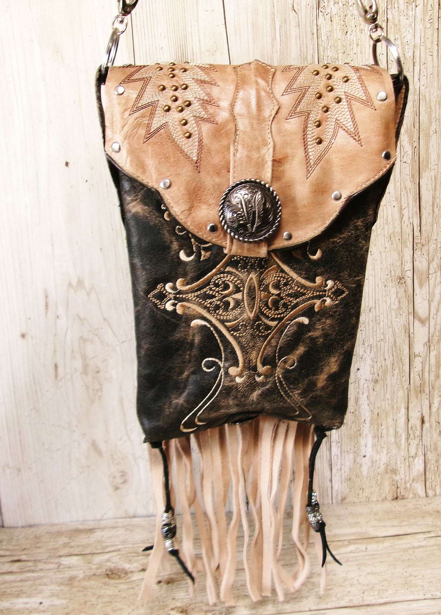 Cowboy Boot Crossbody Hipster Bag with Fringe HP1142 handcrafted from cowboy boots. Shop Handbags at ChrisThompsonBags.com and buy the best ["Crossbody","feathers","fringe","Hipster","Small"] at Chris Thompson Bags.