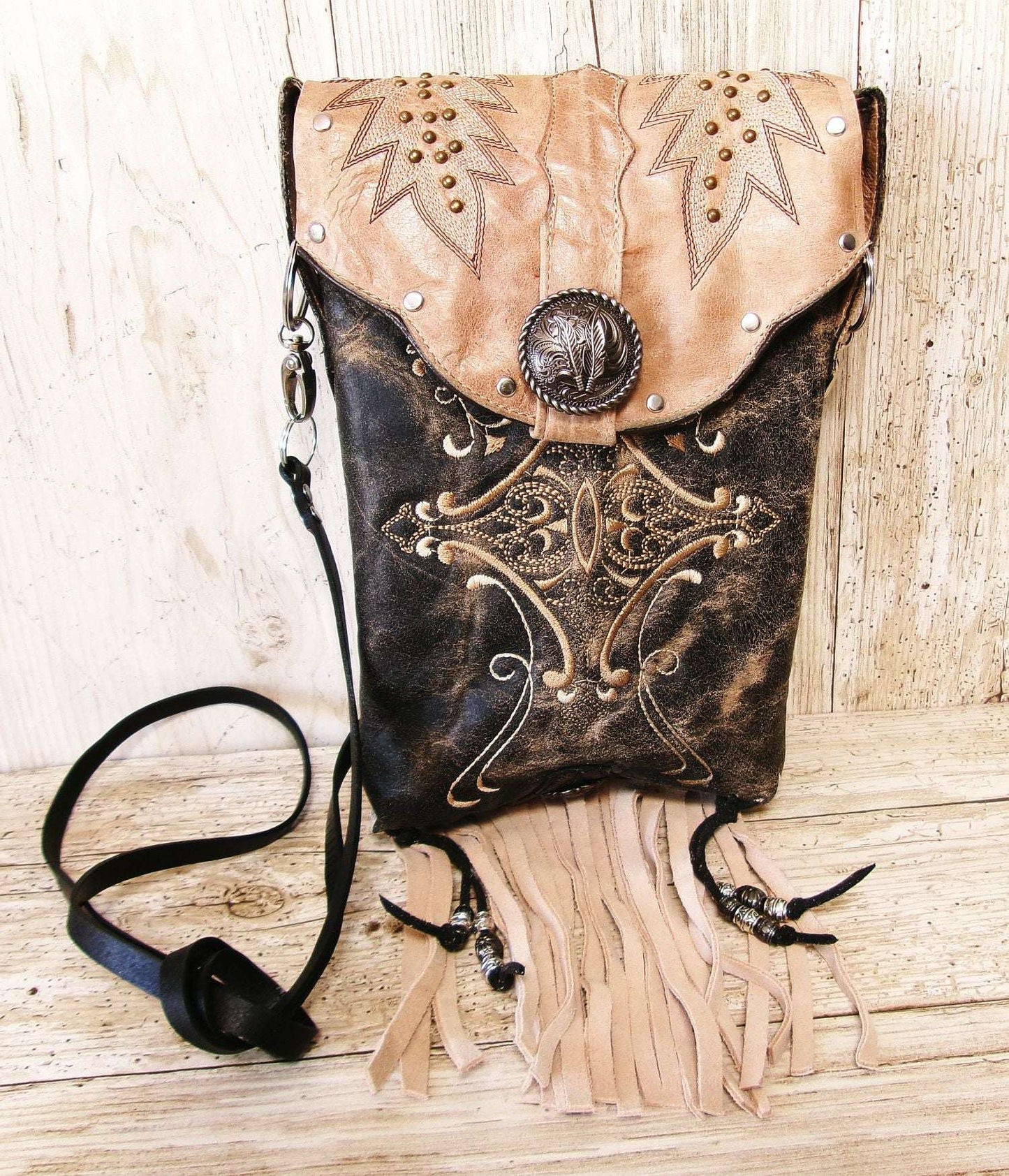 Cowboy Boot Crossbody Hipster Bag with Fringe HP1142 handcrafted from cowboy boots. Shop Handbags at ChrisThompsonBags.com and buy the best ["Crossbody","feathers","fringe","Hipster","Small"] at Chris Thompson Bags.