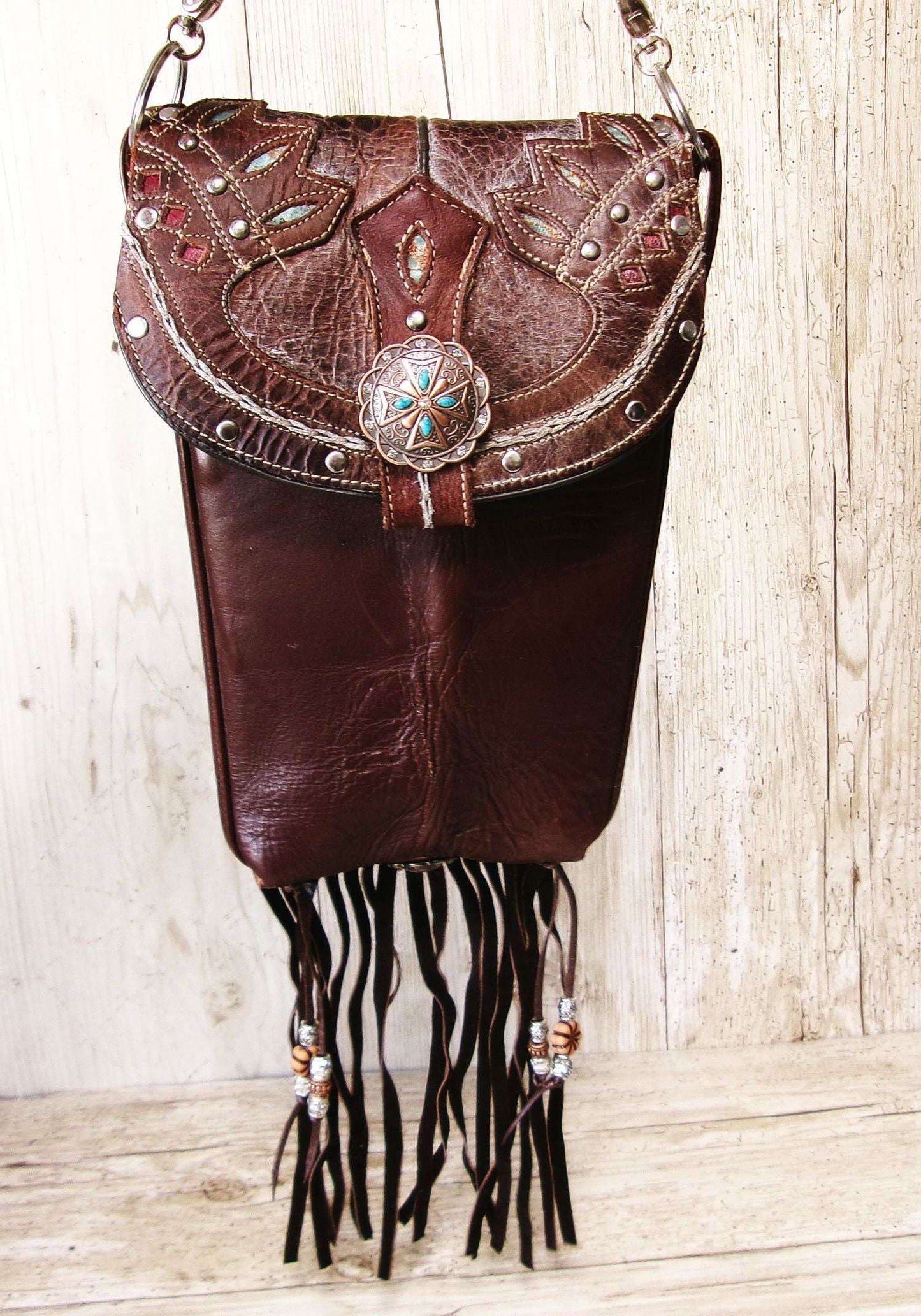 Cowboy Boot Crossbody Hipster Bag with Fringe HP1143 handcrafted from cowboy boots. Shop Handbags at ChrisThompsonBags.com and buy the best ["Crossbody","feathers","fringe","Hipster","Small"] at Chris Thompson Bags.