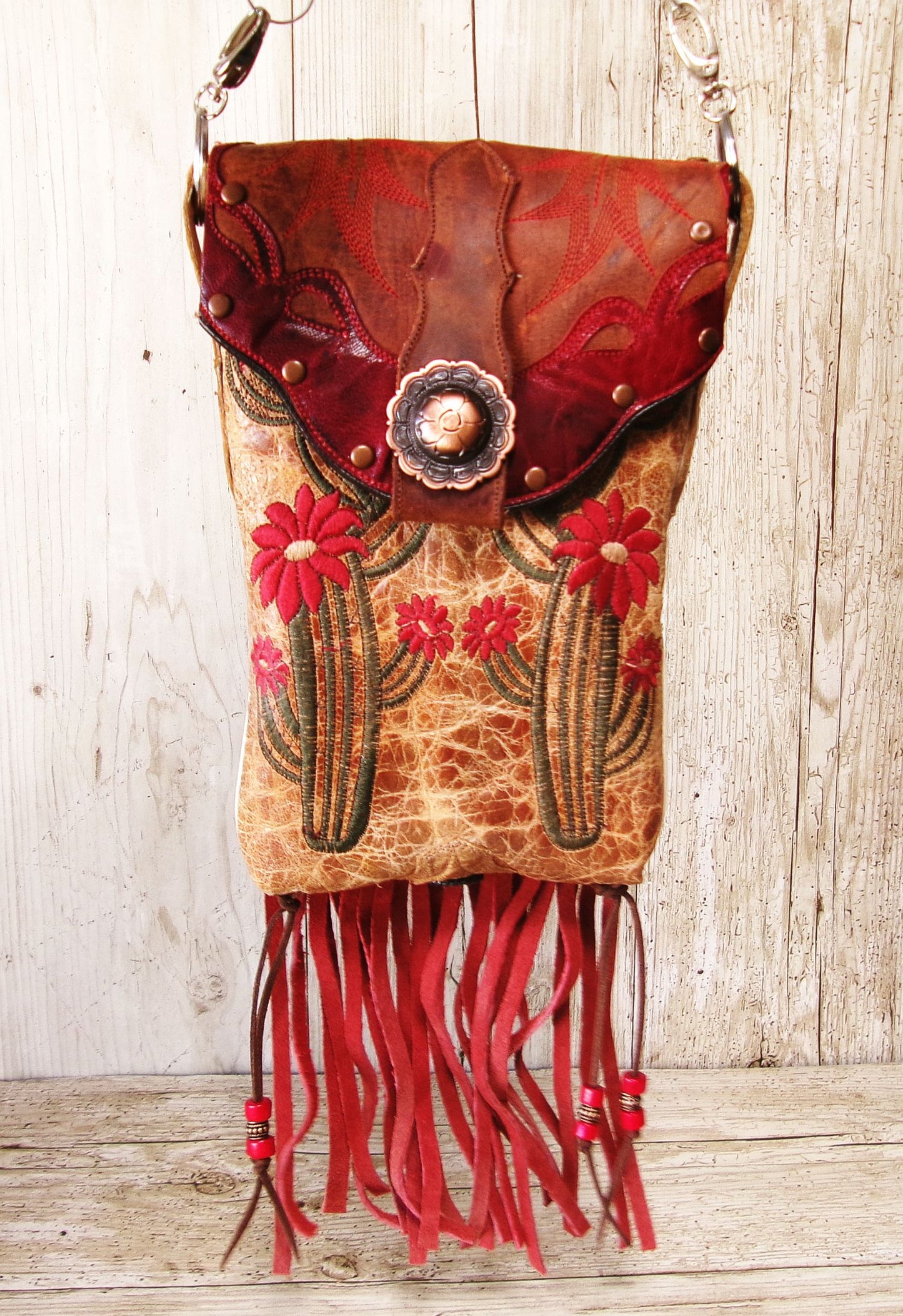 Cowboy Boot Crossbody Hipster Bag with Fringe HP1144 handcrafted from cowboy boots. Shop Handbags at ChrisThompsonBags.com and buy the best ["cactus","Crossbody","fringe","Hipster","Small"] at Chris Thompson Bags.