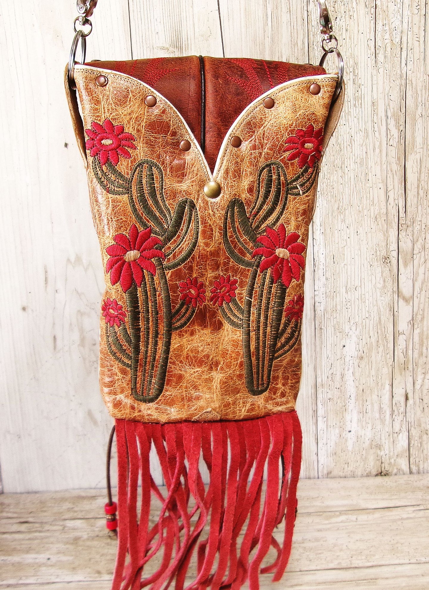 Cowboy Boot Crossbody Hipster Bag with Fringe HP1144 handcrafted from cowboy boots. Shop Handbags at ChrisThompsonBags.com and buy the best ["cactus","Crossbody","fringe","Hipster","Small"] at Chris Thompson Bags.