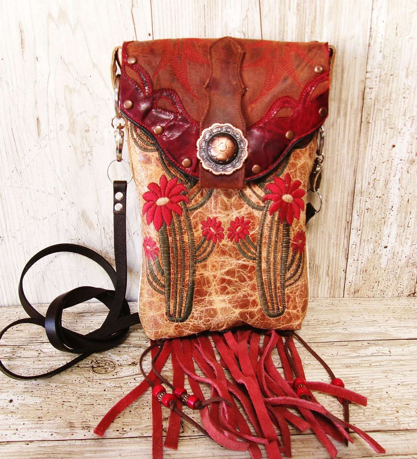 Cowboy Boot Crossbody Hipster Bag with Fringe HP1144 handcrafted from cowboy boots. Shop Handbags at ChrisThompsonBags.com and buy the best ["cactus","Crossbody","fringe","Hipster","Small"] at Chris Thompson Bags.