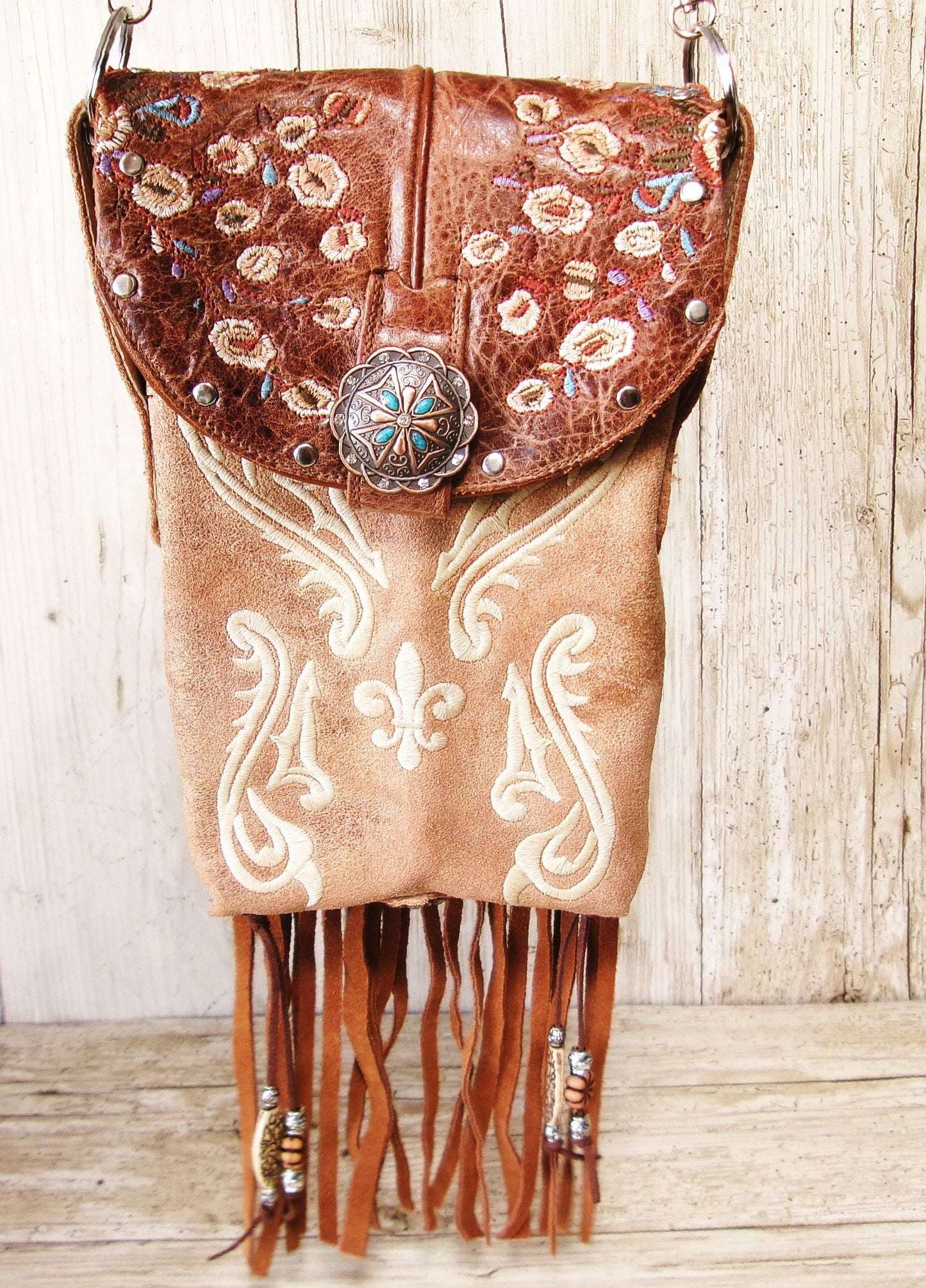 Cowboy Boot Crossbody Hipster Bag with Fringe HP1146 handcrafted from cowboy boots. Shop Handbags at ChrisThompsonBags.com and buy the best ["Crossbody","flowers","fringe","Hipster","Small"] at Chris Thompson Bags.
