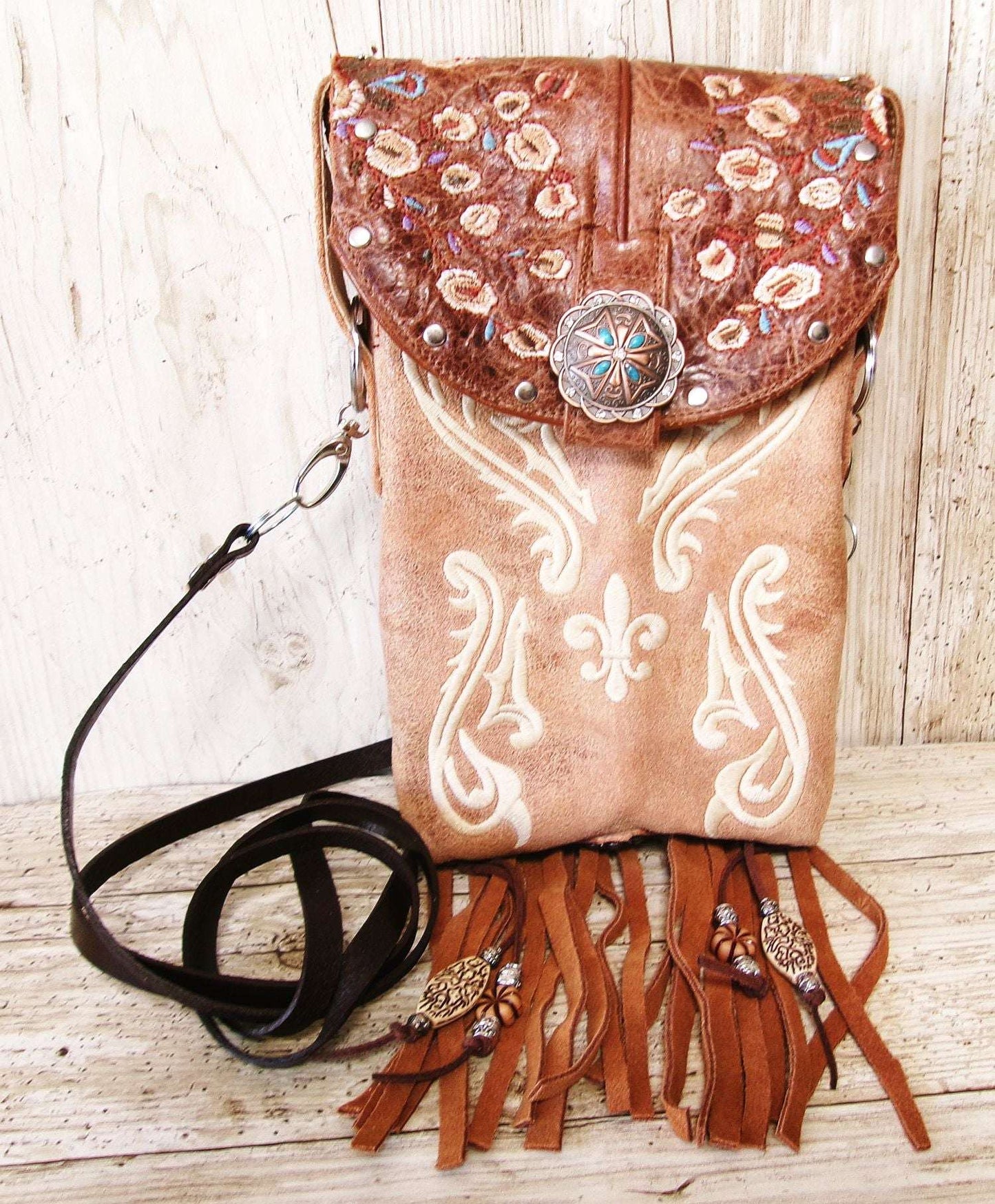 Cowboy Boot Crossbody Hipster Bag with Fringe HP1146 handcrafted from cowboy boots. Shop Handbags at ChrisThompsonBags.com and buy the best ["Crossbody","flowers","fringe","Hipster","Small"] at Chris Thompson Bags.