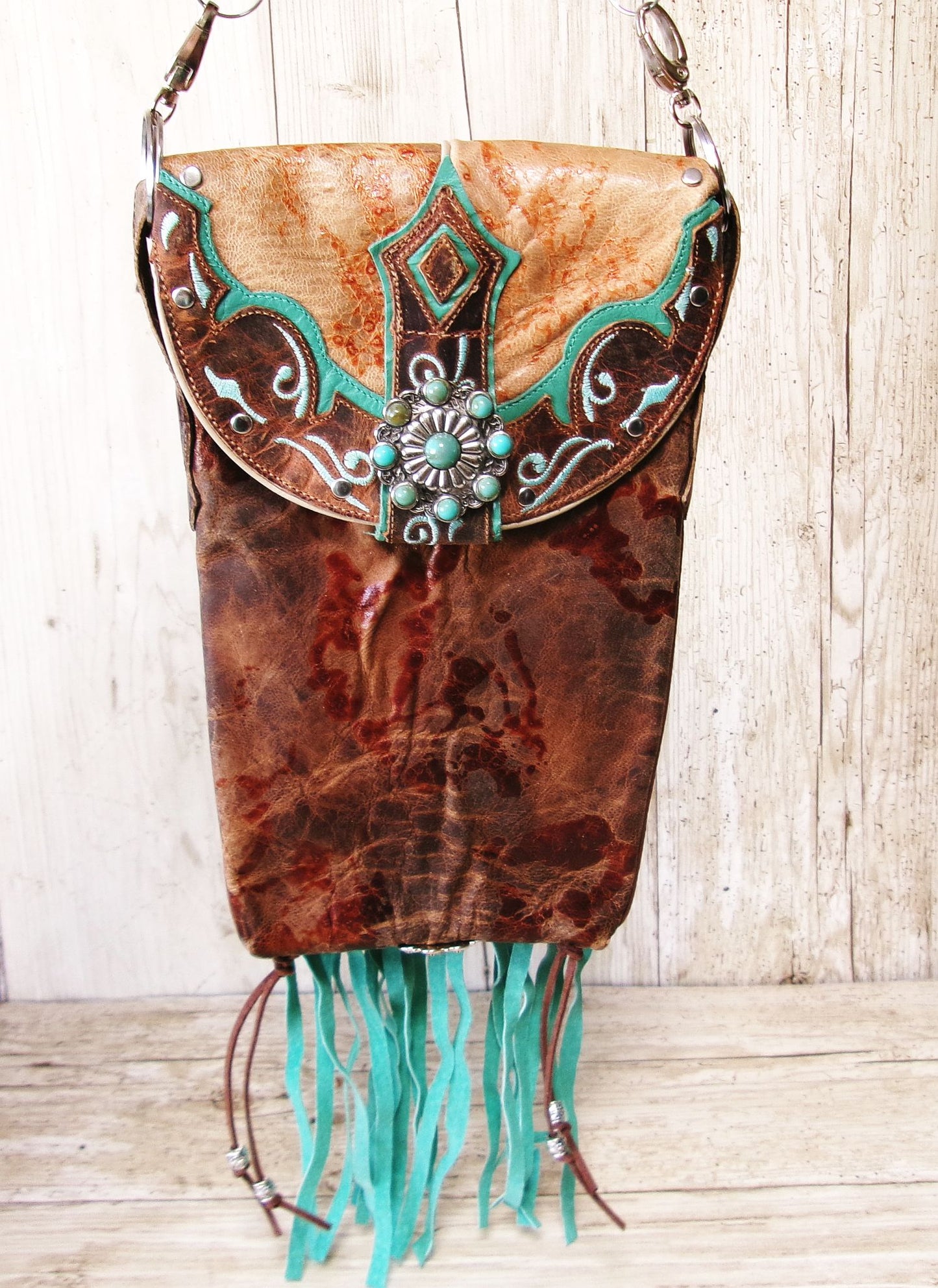 Cowboy Boot Crossbody Hipster Bag with Fringe HP1149 handcrafted from cowboy boots. Shop Handbags at ChrisThompsonBags.com and buy the best ["Crossbody","fringe","Hipster","Small","Turquoise"] at Chris Thompson Bags.
