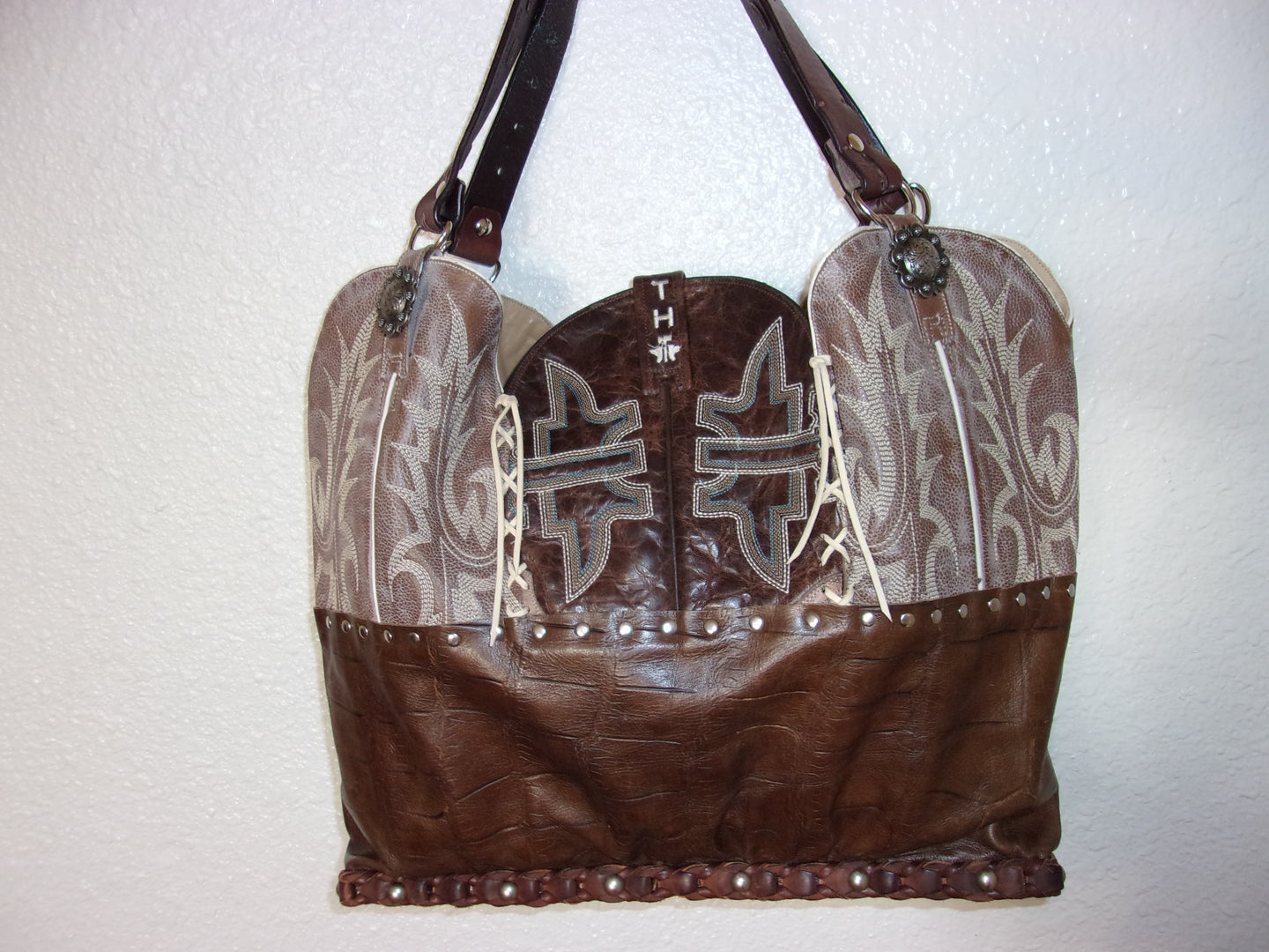 Cowboy Boot Laptop Tote LT23 handcrafted from cowboy boots. Shop Handbags at ChrisThompsonBags.com and buy the best boot purse, cowboy boot purse, cowgirl handbag, leather laptop tote, recycled cowboy boots, unique gift for her, unique gift for him, unique travel bag, western diaper bag, western laptop tote, western travel bag, XL cowboy Boot Purse, XL leather tote at Chris Thompson Bags.