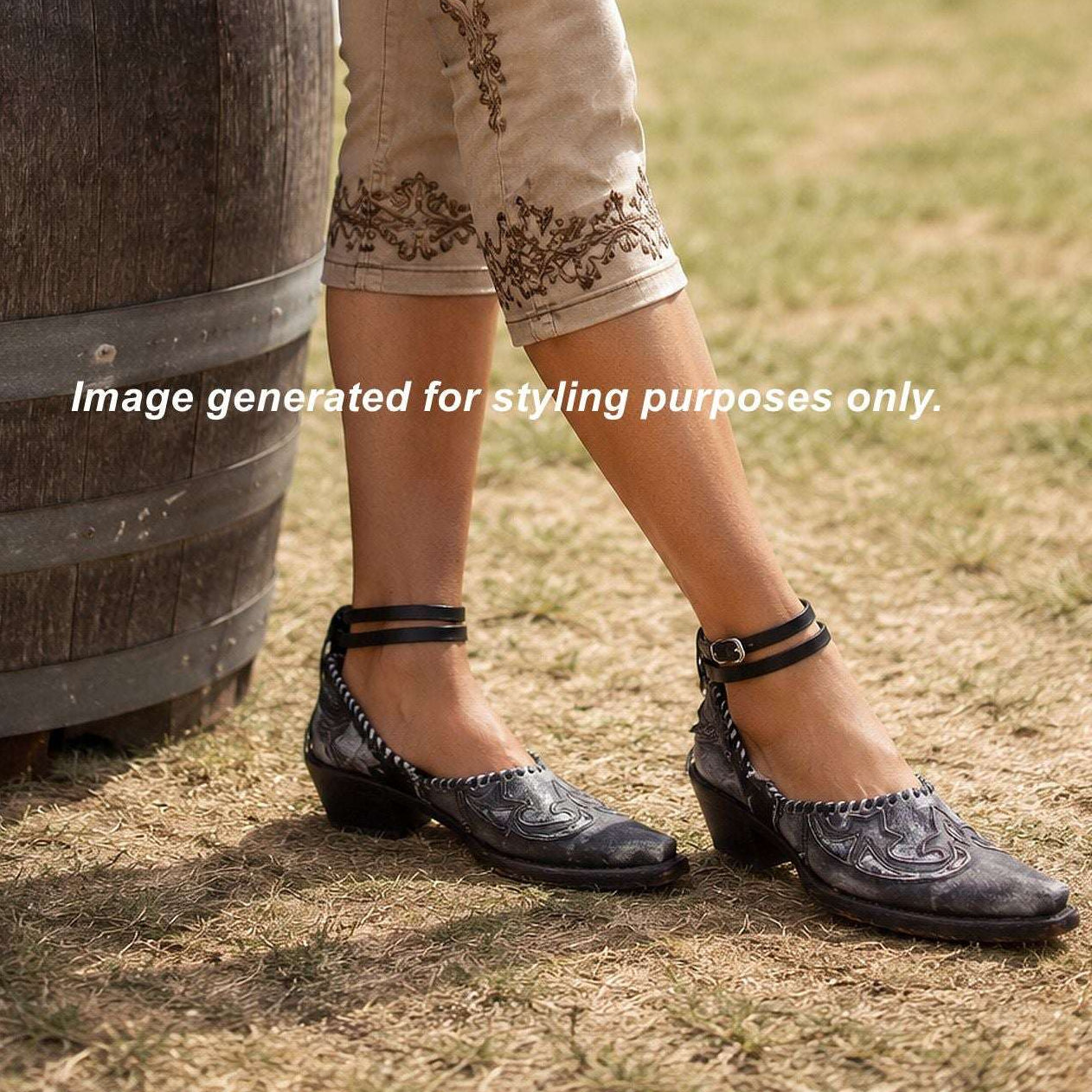 Person wearing beige capri pants with intricate designs, standing next to a wooden barrel at an outdoor event.