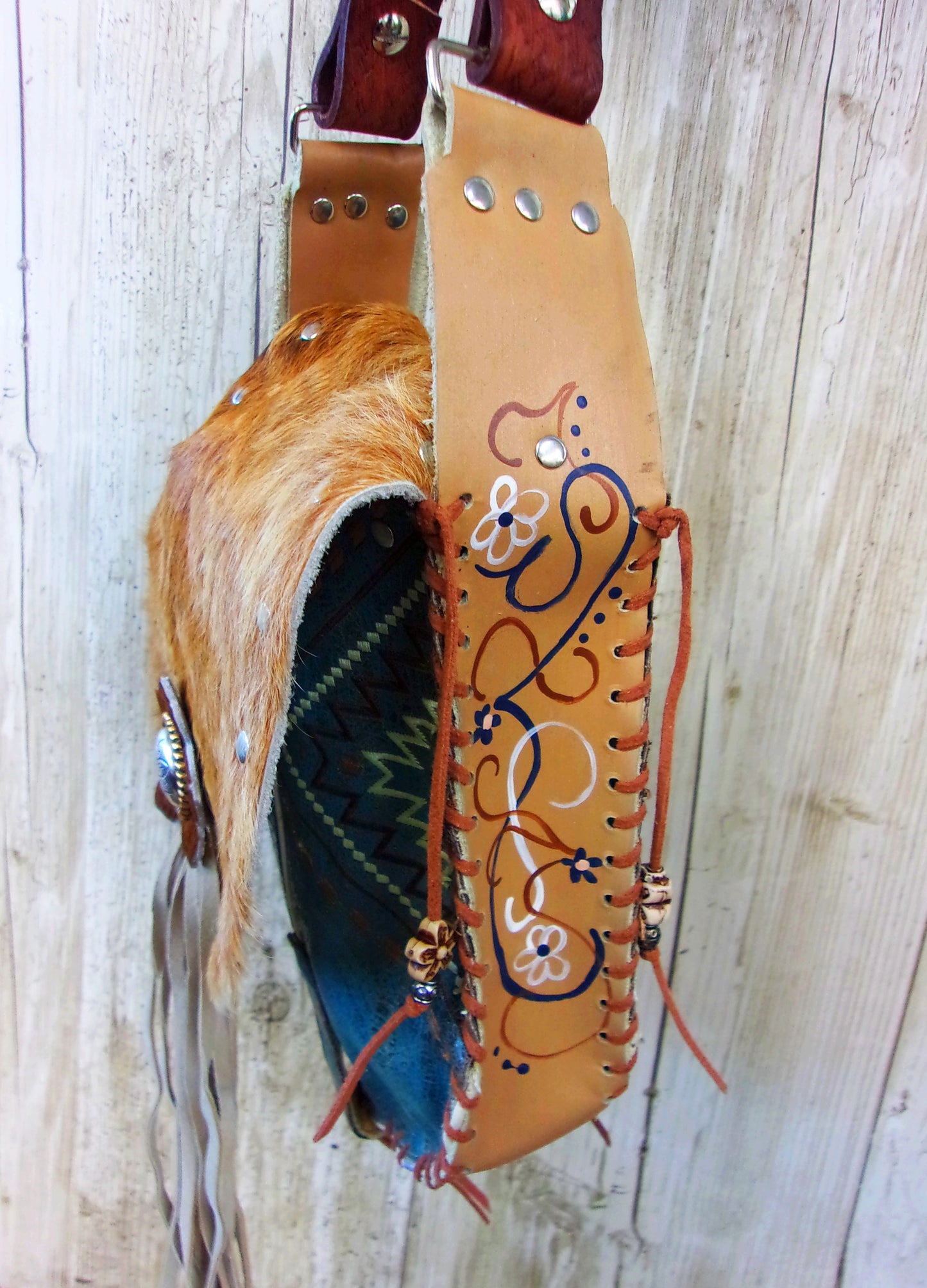 Hand-Painted Boho Bag P02 handcrafted from cowboy boots. Shop Handbags at ChrisThompsonBags.com and buy the best boho purse, boot purse, boot top purse, Country Chic, country fashion, cowboy boot lover, cowboy boot purse, cowboy boot purses, Cowgirl Chic, cowgirl gift, cowgirl hippie bag, cowgirl style, cowhide purse, hair on hide purse, purse with fringe, unique gift for her at Chris Thompson Bags.