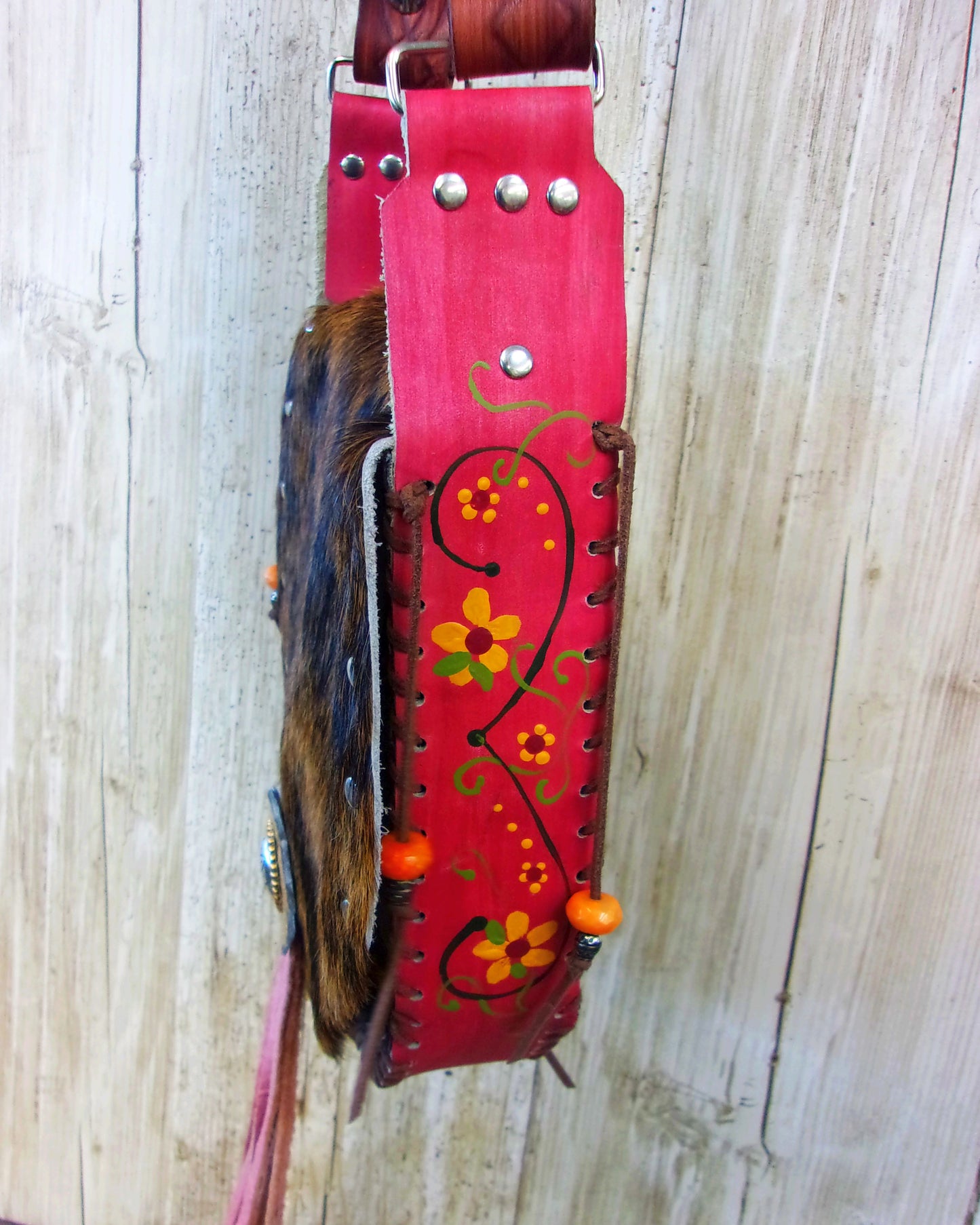 Hand-Painted Boho Bag P03 handcrafted from cowboy boots. Shop Handbags at ChrisThompsonBags.com and buy the best boho purse, boot purse, boot top purse, Country Chic, country fashion, cowboy boot lover, cowboy boot purse, cowboy boot purses, Cowgirl Chic, cowgirl gift, cowgirl hippie bag, cowgirl style, cowhide purse, hair on hide purse, purse with fringe, unique gift for her at Chris Thompson Bags.