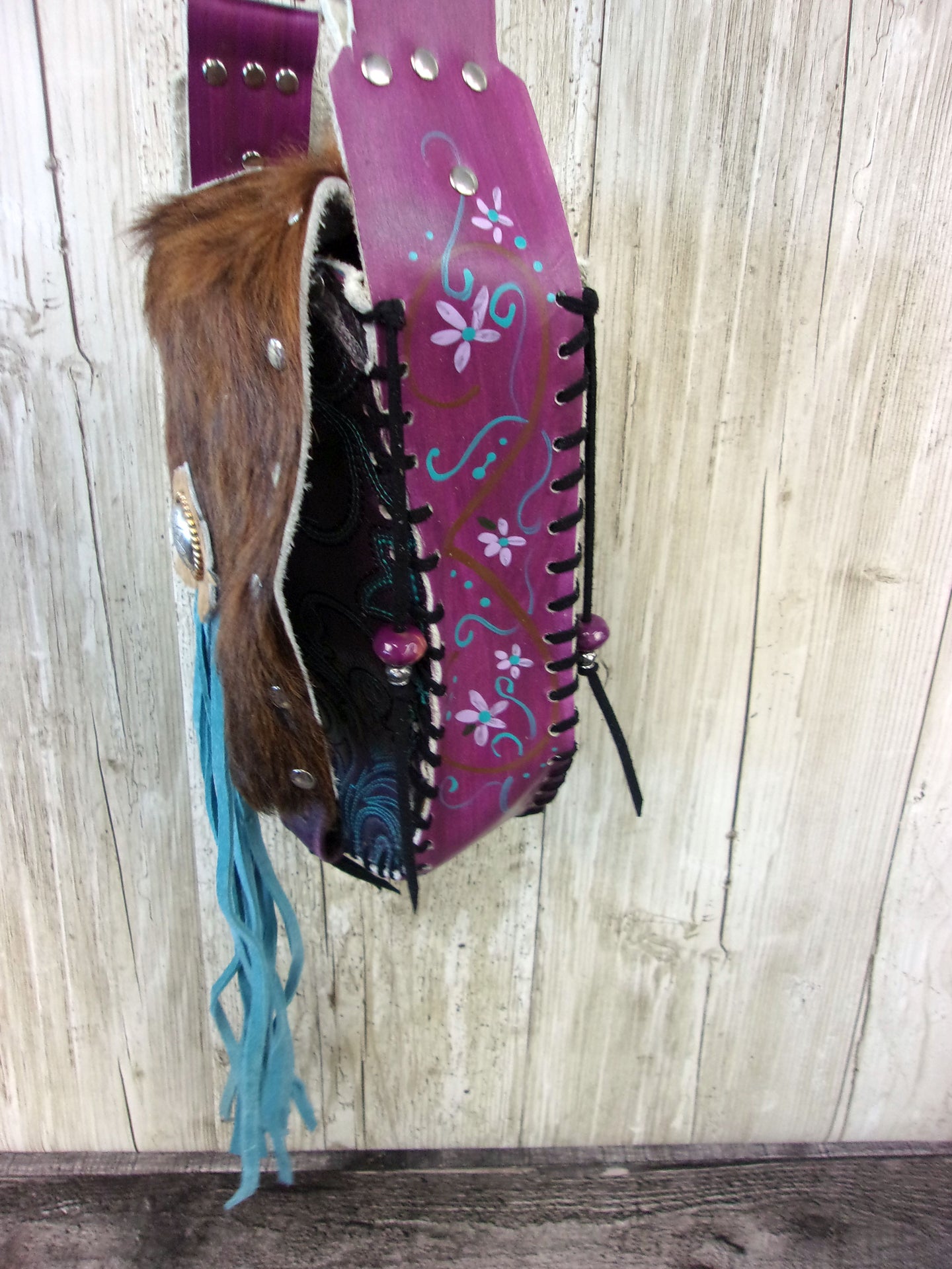 Hand-Painted Boho Bag P05 handcrafted from cowboy boots. Shop Handbags at ChrisThompsonBags.com and buy the best boho purse, boot purse, boot top purse, Country Chic, country fashion, cowboy boot lover, cowboy boot purse, cowboy boot purses, Cowgirl Chic, cowgirl gift, cowgirl hippie bag, cowgirl style, cowhide purse, hair on hide purse, purse with fringe, unique gift for her at Chris Thompson Bags.