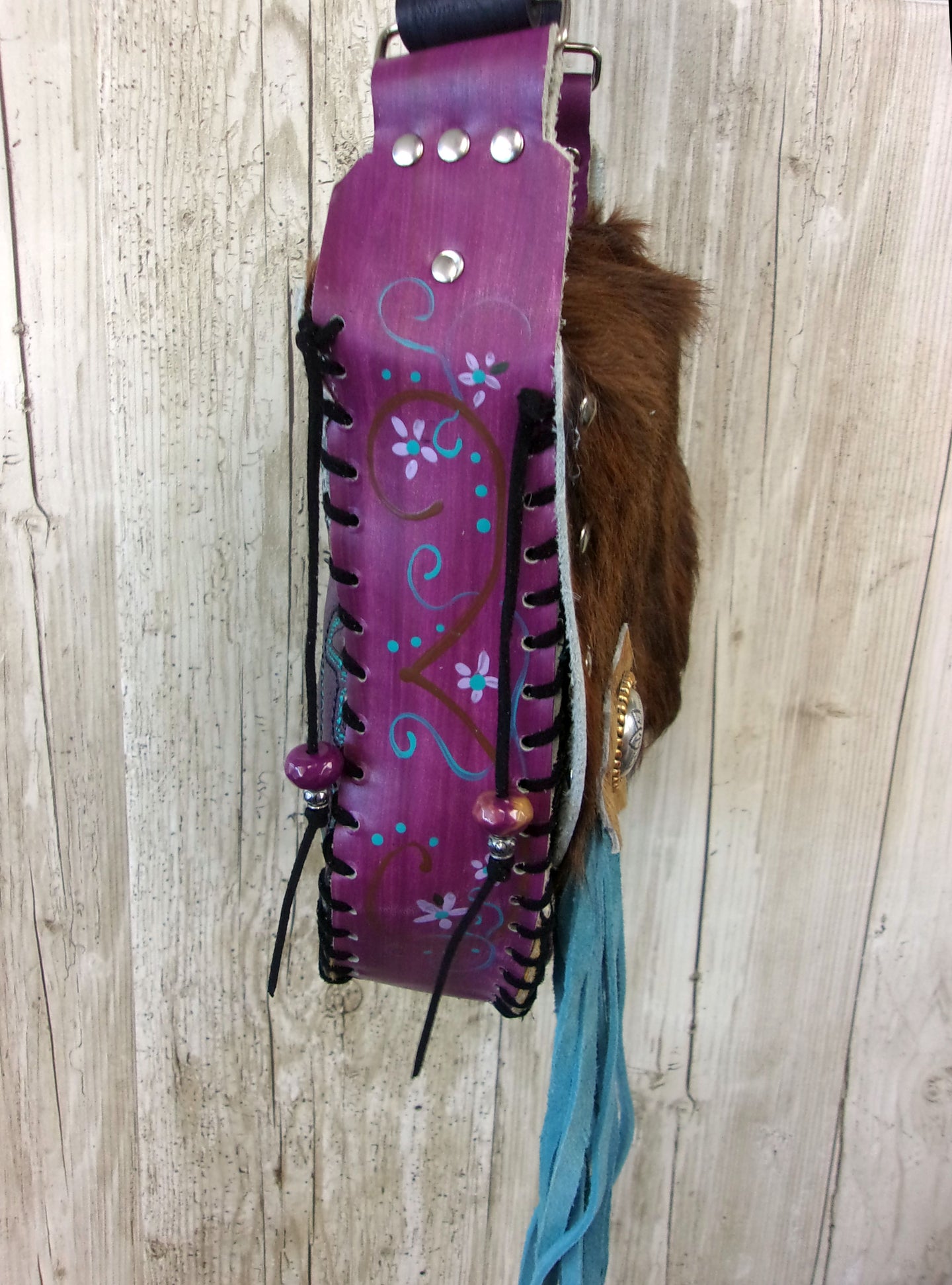 Hand-Painted Boho Bag P05 handcrafted from cowboy boots. Shop Handbags at ChrisThompsonBags.com and buy the best boho purse, boot purse, boot top purse, Country Chic, country fashion, cowboy boot lover, cowboy boot purse, cowboy boot purses, Cowgirl Chic, cowgirl gift, cowgirl hippie bag, cowgirl style, cowhide purse, hair on hide purse, purse with fringe, unique gift for her at Chris Thompson Bags.