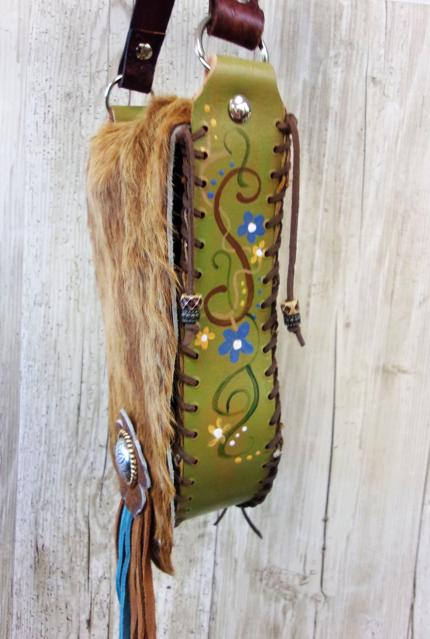 Hand-Painted Boho Bag P06 handcrafted from cowboy boots. Shop Handbags at ChrisThompsonBags.com and buy the best boho purse, boot purse, boot top purse, Country Chic, country fashion, cowboy boot lover, cowboy boot purse, cowboy boot purses, Cowgirl Chic, cowgirl gift, cowgirl hippie bag, cowgirl style, cowhide purse, hair on hide purse, purse with fringe, unique gift for her at Chris Thompson Bags.