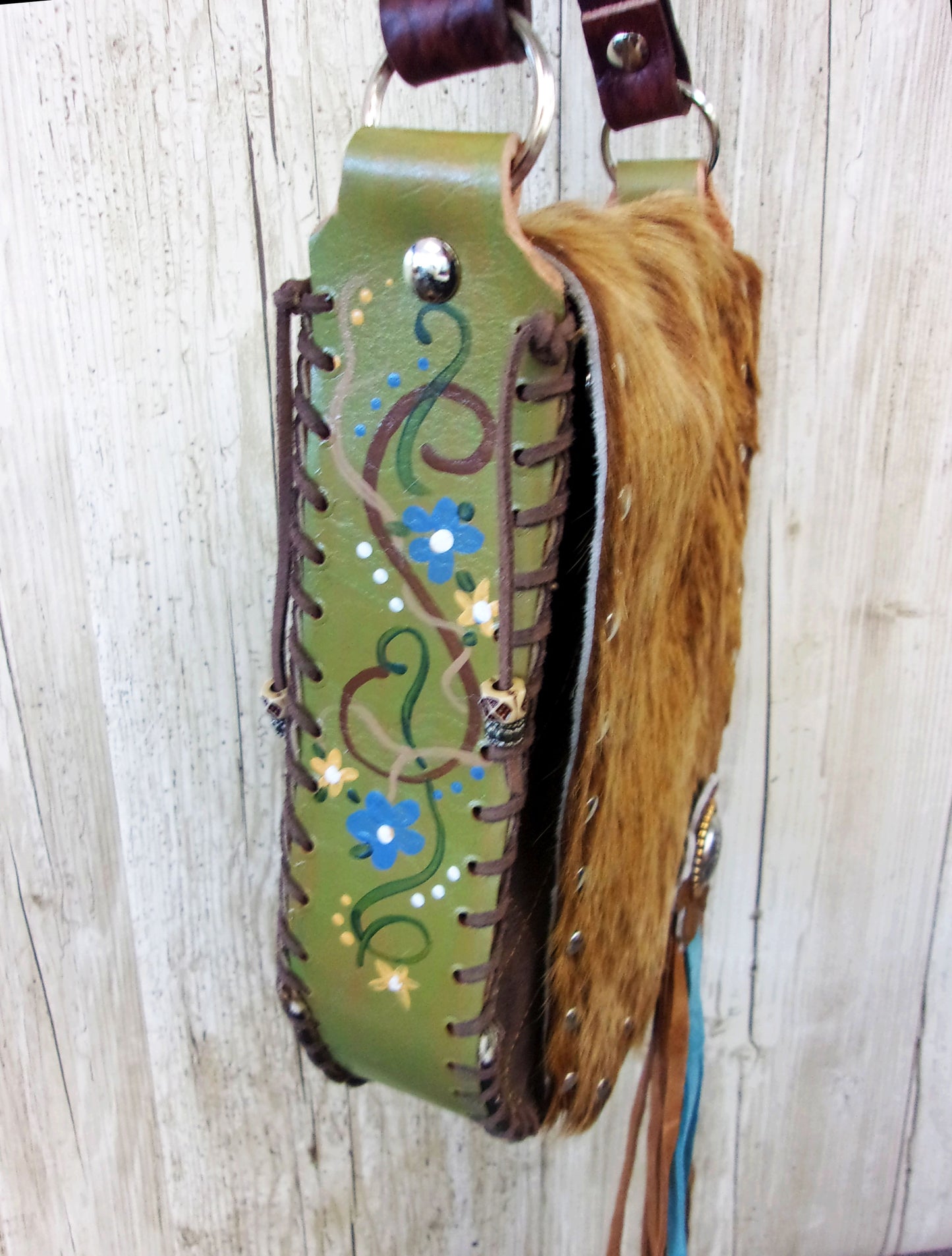 Hand-Painted Boho Bag P06 handcrafted from cowboy boots. Shop Handbags at ChrisThompsonBags.com and buy the best boho purse, boot purse, boot top purse, Country Chic, country fashion, cowboy boot lover, cowboy boot purse, cowboy boot purses, Cowgirl Chic, cowgirl gift, cowgirl hippie bag, cowgirl style, cowhide purse, hair on hide purse, purse with fringe, unique gift for her at Chris Thompson Bags.