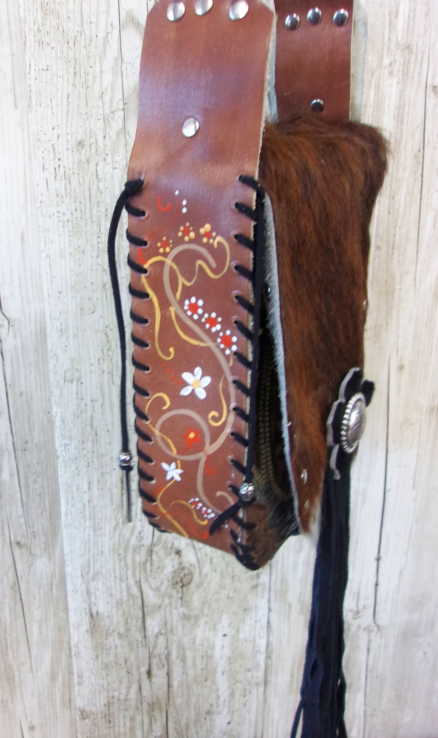 Hand-Painted Boho Bag P07 handcrafted from cowboy boots. Shop Handbags at ChrisThompsonBags.com and buy the best boho purse, boot purse, boot top purse, Country Chic, country fashion, cowboy boot lover, cowboy boot purse, cowboy boot purses, Cowgirl Chic, cowgirl gift, cowgirl hippie bag, cowgirl style, cowhide purse, hair on hide purse, purse with fringe, unique gift for her at Chris Thompson Bags.