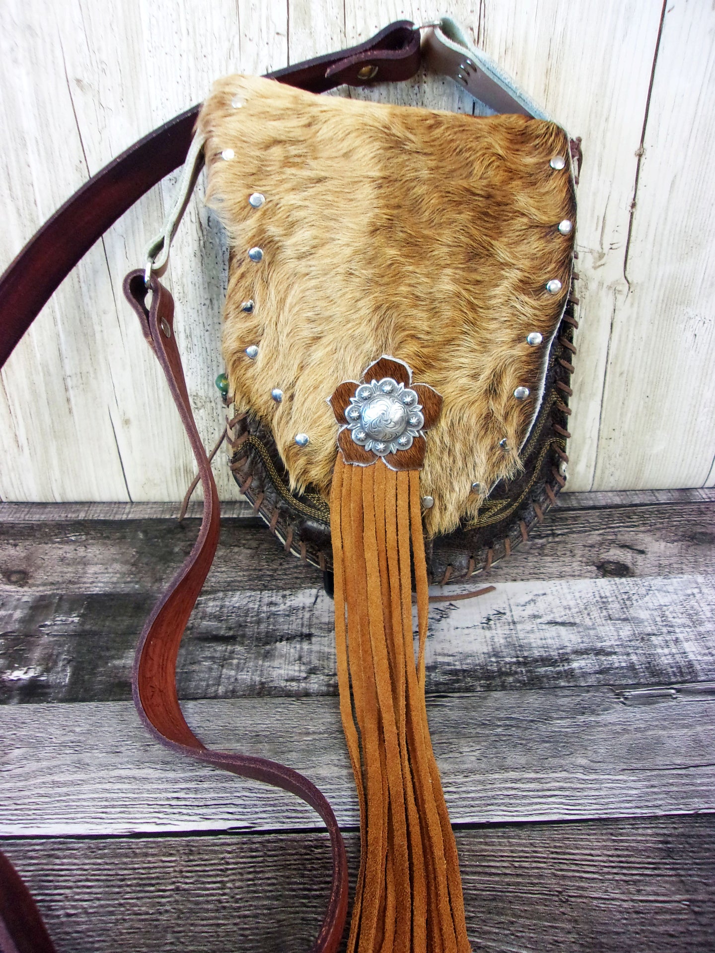 Hand-Painted Boho Bag P09 handcrafted from cowboy boots. Shop Handbags at ChrisThompsonBags.com and buy the best boho purse, boot purse, boot top purse, Country Chic, country fashion, cowboy boot lover, cowboy boot purse, cowboy boot purses, Cowgirl Chic, cowgirl gift, cowgirl hippie bag, cowgirl style, cowhide purse, hair on hide purse, purse with fringe, unique gift for her at Chris Thompson Bags.