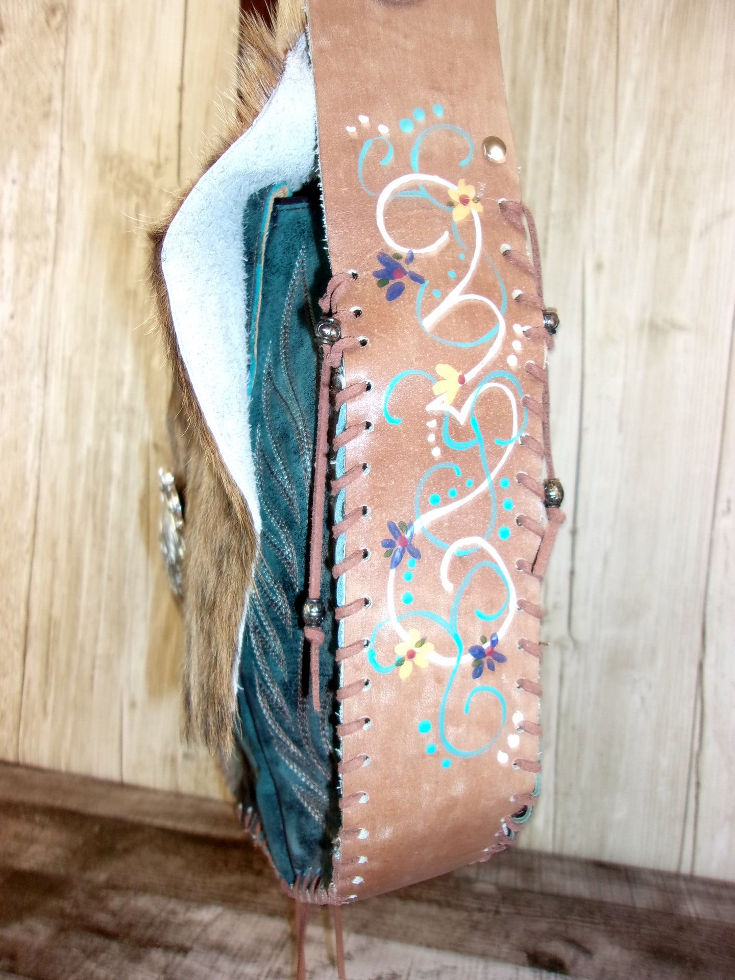 Hand-Painted Boho Bag P010 handcrafted from cowboy boots. Shop Handbags at ChrisThompsonBags.com and buy the best boho purse, boot purse, boot top purse, Country Chic, country fashion, cowboy boot lover, cowboy boot purse, cowboy boot purses, Cowgirl Chic, cowgirl gift, cowgirl hippie bag, cowgirl style, cowhide purse, hair on hide purse, purse with fringe, unique gift for her at Chris Thompson Bags.