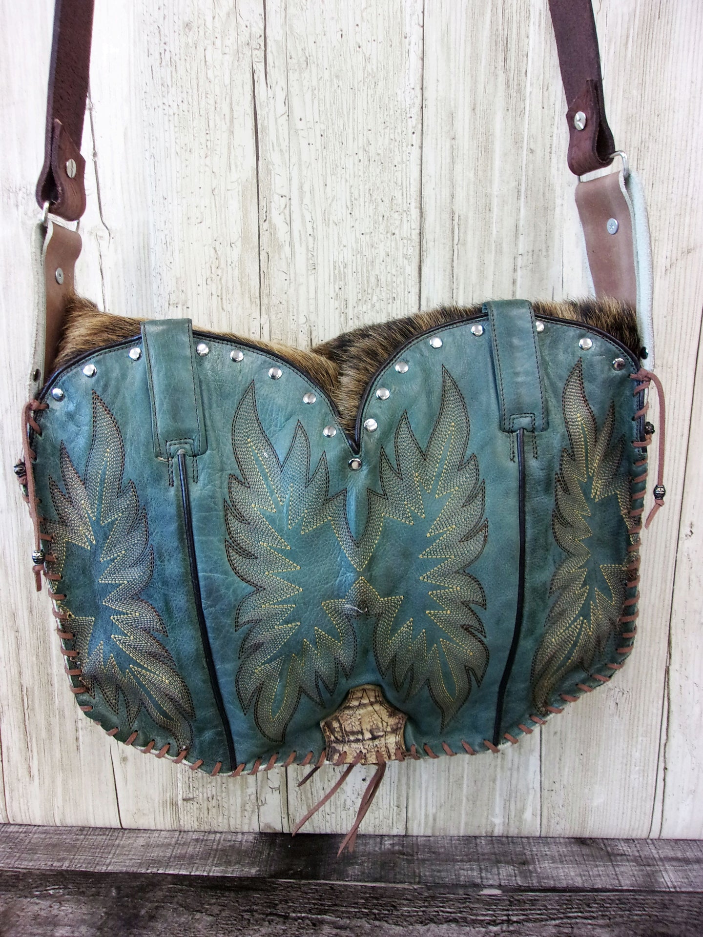 Hand-Painted Boho Bag P010 handcrafted from cowboy boots. Shop Handbags at ChrisThompsonBags.com and buy the best boho purse, boot purse, boot top purse, Country Chic, country fashion, cowboy boot lover, cowboy boot purse, cowboy boot purses, Cowgirl Chic, cowgirl gift, cowgirl hippie bag, cowgirl style, cowhide purse, hair on hide purse, purse with fringe, unique gift for her at Chris Thompson Bags.