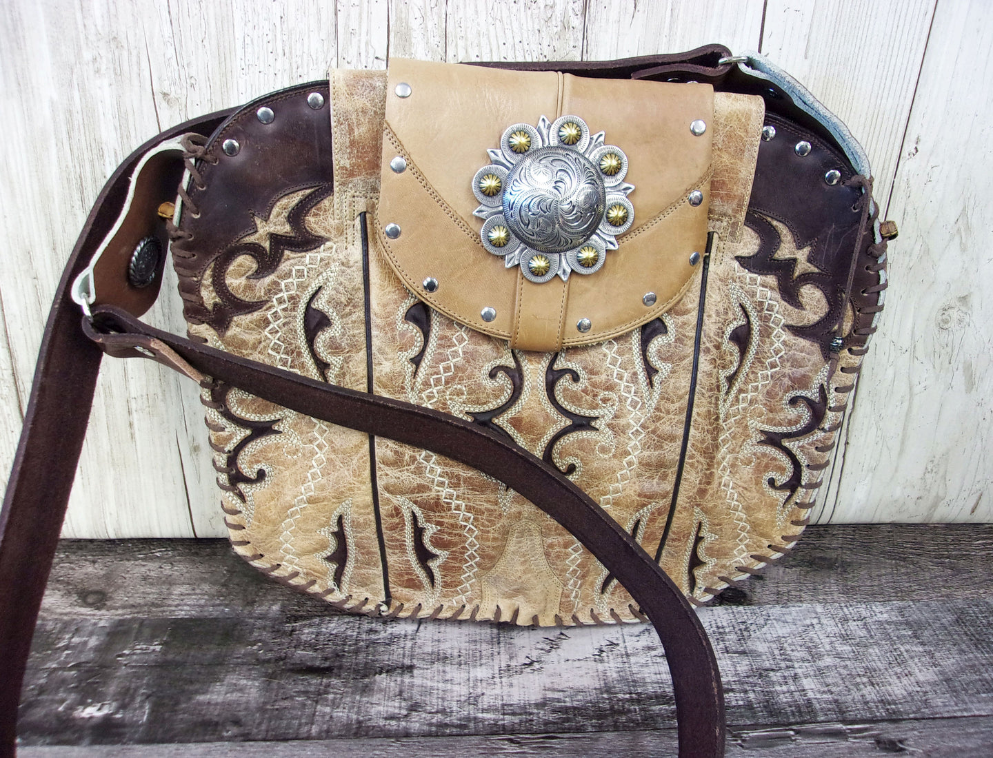 Hand-Painted Boho Bag P013 handcrafted from cowboy boots. Shop Handbags at ChrisThompsonBags.com and buy the best boho purse, boot purse, boot top purse, Country Chic, country fashion, cowboy boot lover, cowboy boot purse, cowboy boot purses, Cowgirl Chic, cowgirl gift, cowgirl hippie bag, cowgirl style, cowhide purse, hair on hide purse, purse with fringe, unique gift for her at Chris Thompson Bags.