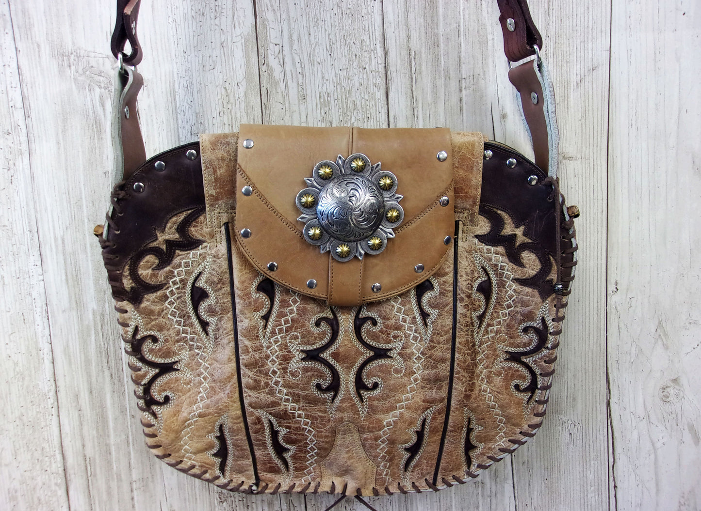 Hand-Painted Boho Bag P013 handcrafted from cowboy boots. Shop Handbags at ChrisThompsonBags.com and buy the best boho purse, boot purse, boot top purse, Country Chic, country fashion, cowboy boot lover, cowboy boot purse, cowboy boot purses, Cowgirl Chic, cowgirl gift, cowgirl hippie bag, cowgirl style, cowhide purse, hair on hide purse, purse with fringe, unique gift for her at Chris Thompson Bags.