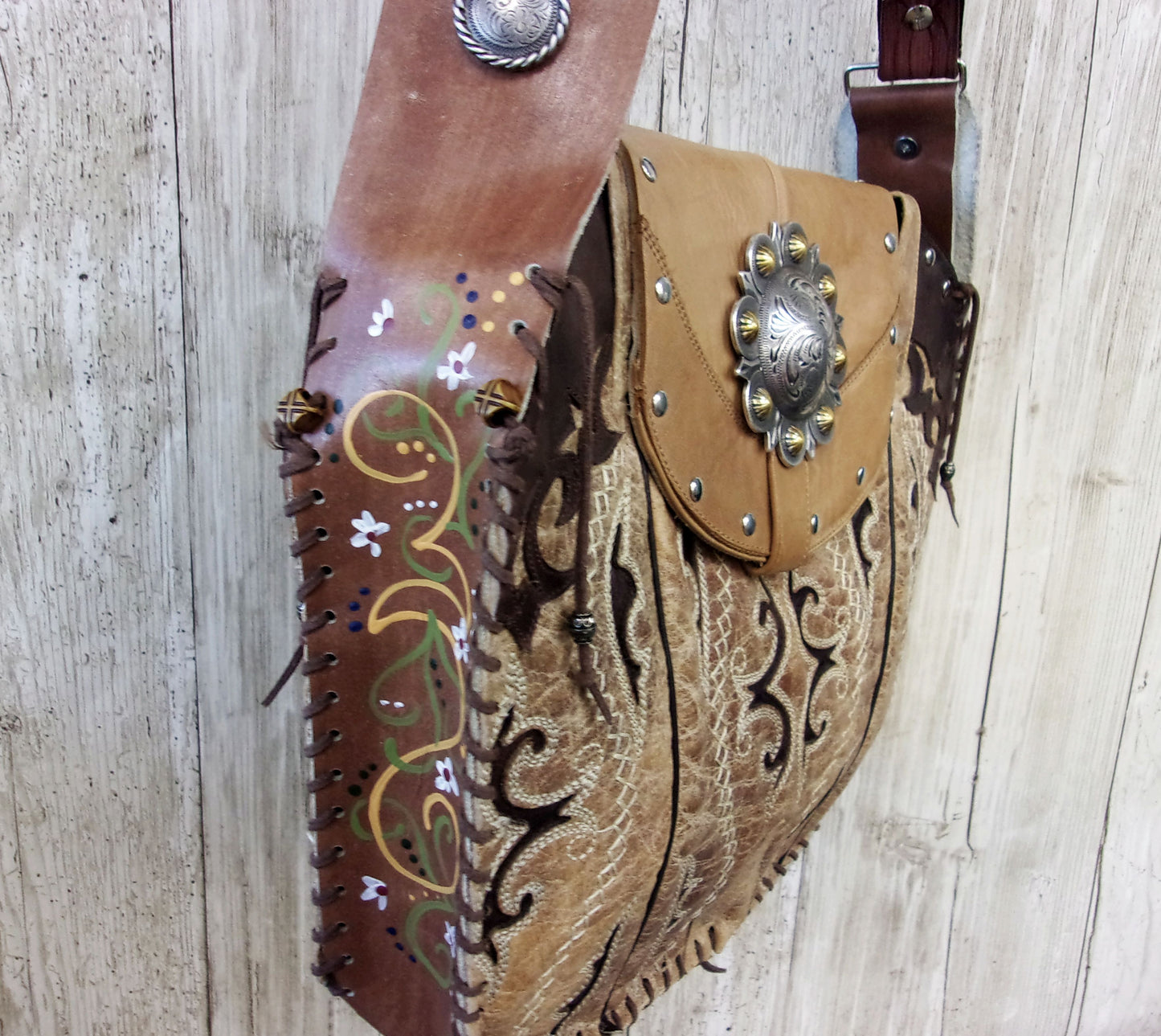 Hand-Painted Boho Bag P013 handcrafted from cowboy boots. Shop Handbags at ChrisThompsonBags.com and buy the best boho purse, boot purse, boot top purse, Country Chic, country fashion, cowboy boot lover, cowboy boot purse, cowboy boot purses, Cowgirl Chic, cowgirl gift, cowgirl hippie bag, cowgirl style, cowhide purse, hair on hide purse, purse with fringe, unique gift for her at Chris Thompson Bags.