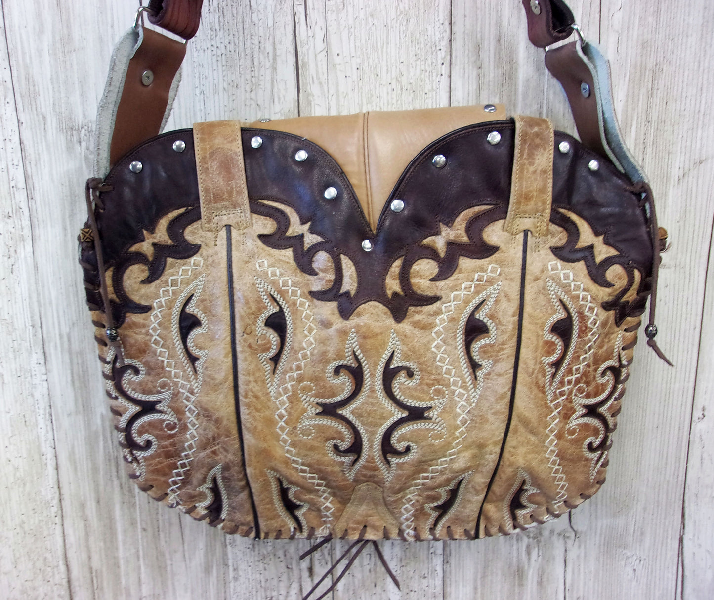 Hand-Painted Boho Bag P013 handcrafted from cowboy boots. Shop Handbags at ChrisThompsonBags.com and buy the best boho purse, boot purse, boot top purse, Country Chic, country fashion, cowboy boot lover, cowboy boot purse, cowboy boot purses, Cowgirl Chic, cowgirl gift, cowgirl hippie bag, cowgirl style, cowhide purse, hair on hide purse, purse with fringe, unique gift for her at Chris Thompson Bags.