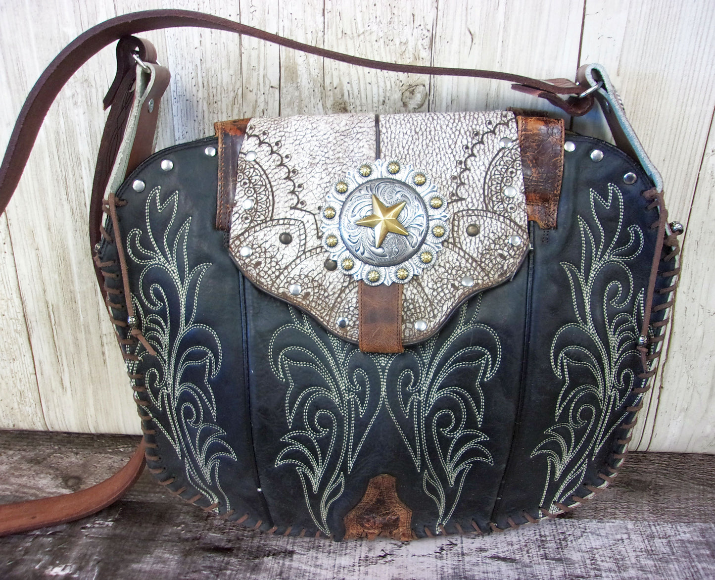 Hand-Painted Boho Bag P014 handcrafted from cowboy boots. Shop Handbags at ChrisThompsonBags.com and buy the best boho purse, boot purse, boot top purse, Country Chic, country fashion, cowboy boot lover, cowboy boot purse, cowboy boot purses, Cowgirl Chic, cowgirl gift, cowgirl hippie bag, cowgirl style, cowhide purse, hair on hide purse, purse with fringe, unique gift for her at Chris Thompson Bags.