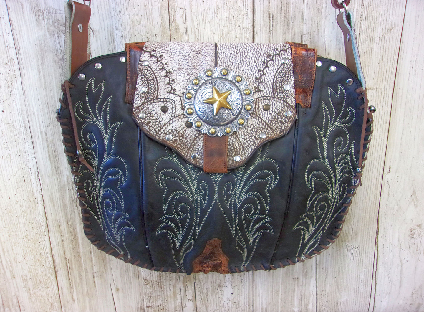 Hand-Painted Boho Bag P014 handcrafted from cowboy boots. Shop Handbags at ChrisThompsonBags.com and buy the best boho purse, boot purse, boot top purse, Country Chic, country fashion, cowboy boot lover, cowboy boot purse, cowboy boot purses, Cowgirl Chic, cowgirl gift, cowgirl hippie bag, cowgirl style, cowhide purse, hair on hide purse, purse with fringe, unique gift for her at Chris Thompson Bags.