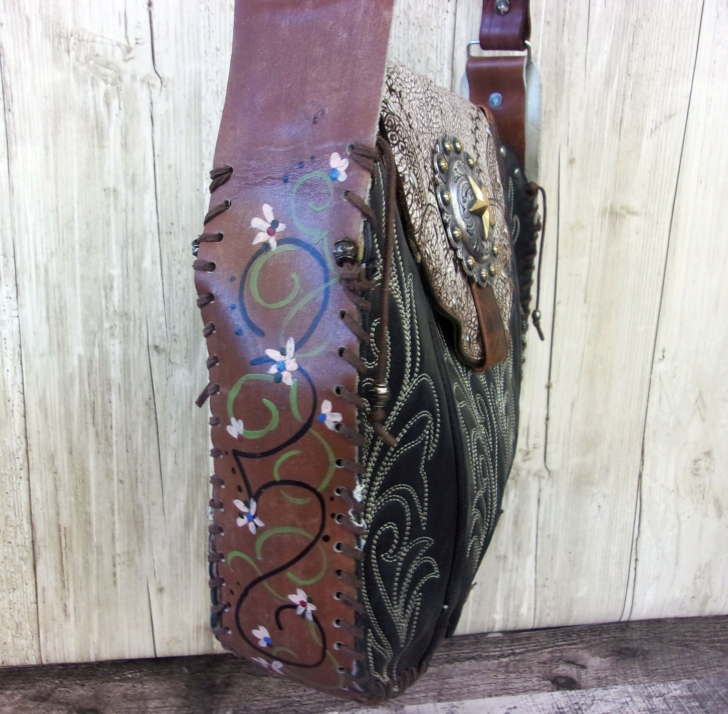 Hand-Painted Boho Bag P014 handcrafted from cowboy boots. Shop Handbags at ChrisThompsonBags.com and buy the best boho purse, boot purse, boot top purse, Country Chic, country fashion, cowboy boot lover, cowboy boot purse, cowboy boot purses, Cowgirl Chic, cowgirl gift, cowgirl hippie bag, cowgirl style, cowhide purse, hair on hide purse, purse with fringe, unique gift for her at Chris Thompson Bags.