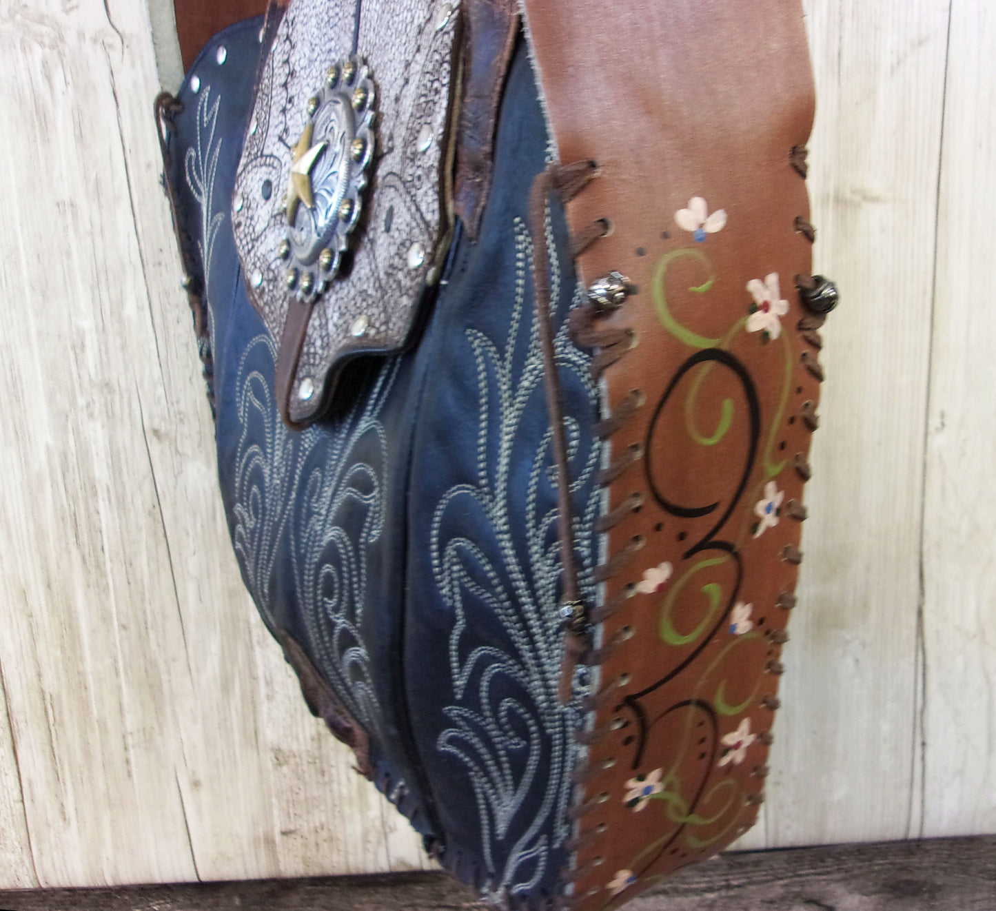 Hand-Painted Boho Bag P014 handcrafted from cowboy boots. Shop Handbags at ChrisThompsonBags.com and buy the best boho purse, boot purse, boot top purse, Country Chic, country fashion, cowboy boot lover, cowboy boot purse, cowboy boot purses, Cowgirl Chic, cowgirl gift, cowgirl hippie bag, cowgirl style, cowhide purse, hair on hide purse, purse with fringe, unique gift for her at Chris Thompson Bags.