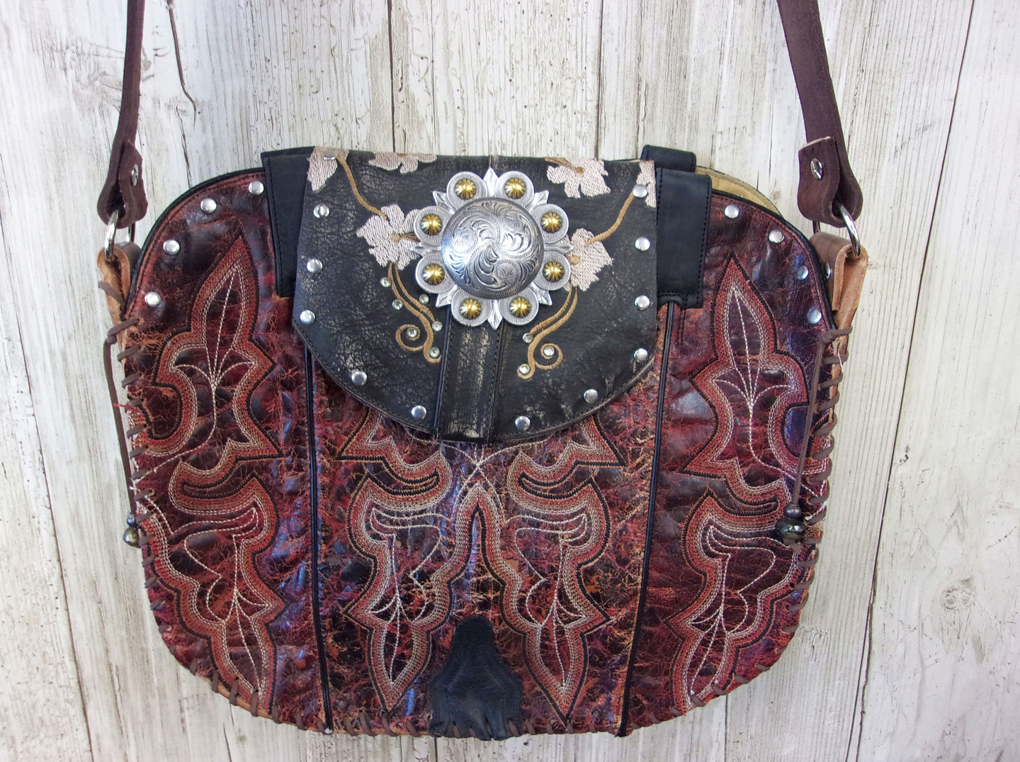 Hand-Painted Boho Bag P015 handcrafted from cowboy boots. Shop Handbags at ChrisThompsonBags.com and buy the best boho purse, boot purse, boot top purse, Country Chic, country fashion, cowboy boot lover, cowboy boot purse, cowboy boot purses, Cowgirl Chic, cowgirl gift, cowgirl hippie bag, cowgirl style, cowhide purse, hair on hide purse, purse with fringe, unique gift for her at Chris Thompson Bags.