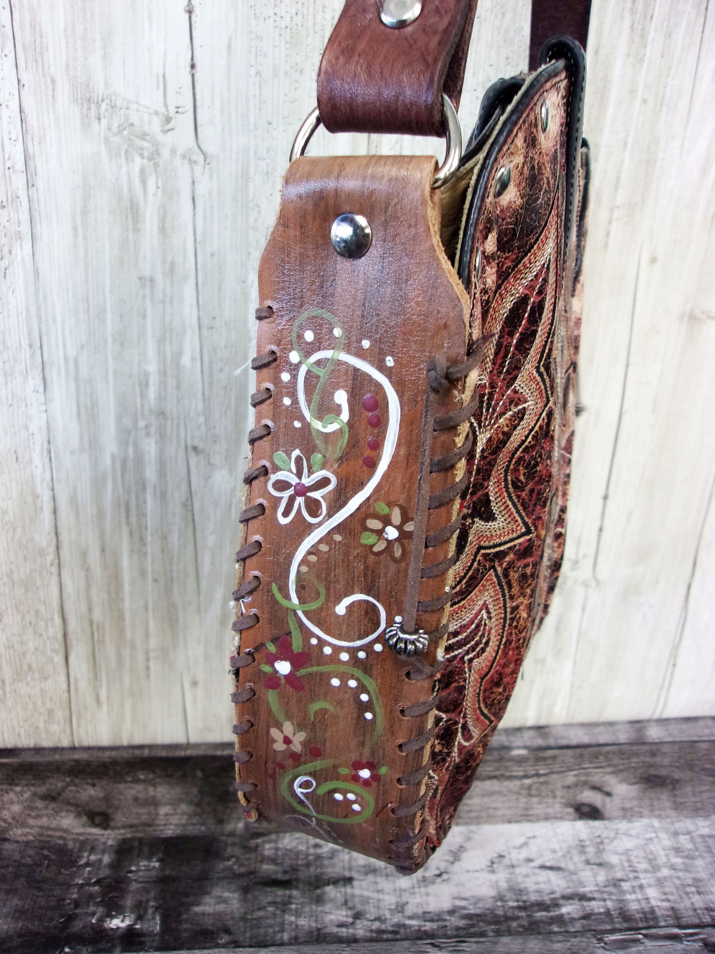 Hand-Painted Boho Bag P015 handcrafted from cowboy boots. Shop Handbags at ChrisThompsonBags.com and buy the best boho purse, boot purse, boot top purse, Country Chic, country fashion, cowboy boot lover, cowboy boot purse, cowboy boot purses, Cowgirl Chic, cowgirl gift, cowgirl hippie bag, cowgirl style, cowhide purse, hair on hide purse, purse with fringe, unique gift for her at Chris Thompson Bags.