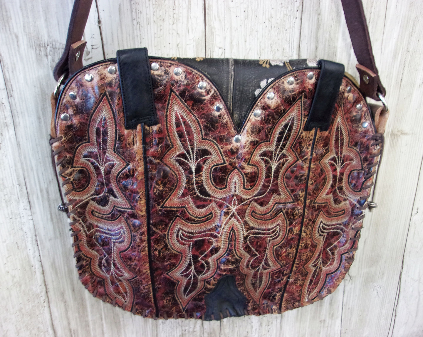 Hand-Painted Boho Bag P015 handcrafted from cowboy boots. Shop Handbags at ChrisThompsonBags.com and buy the best boho purse, boot purse, boot top purse, Country Chic, country fashion, cowboy boot lover, cowboy boot purse, cowboy boot purses, Cowgirl Chic, cowgirl gift, cowgirl hippie bag, cowgirl style, cowhide purse, hair on hide purse, purse with fringe, unique gift for her at Chris Thompson Bags.