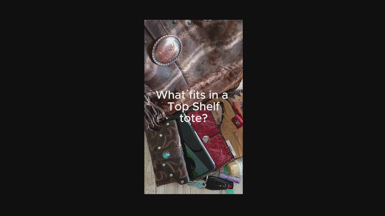 Load video: all the things that fit in a double boot purse
