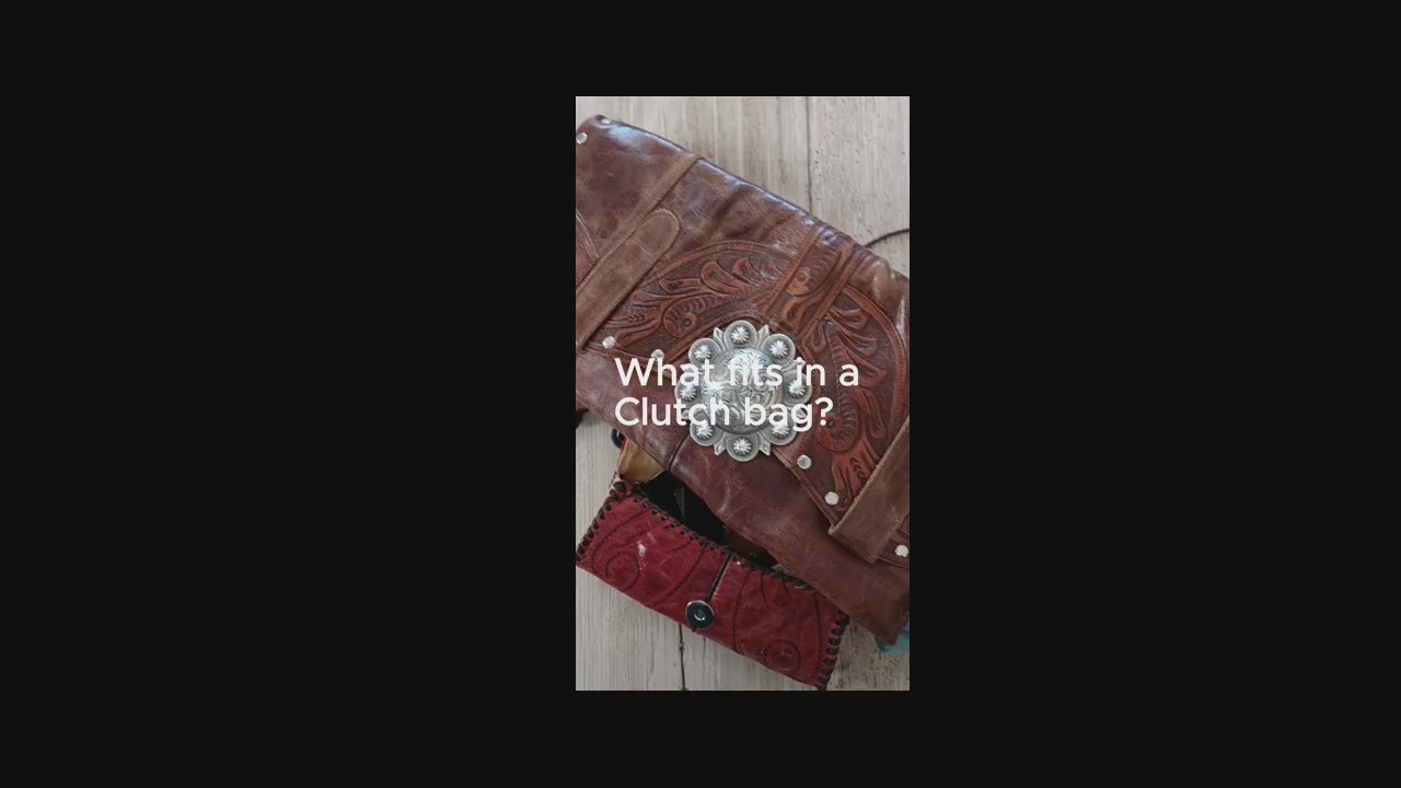 Load video: video showing perfect what fits in clutch bags
