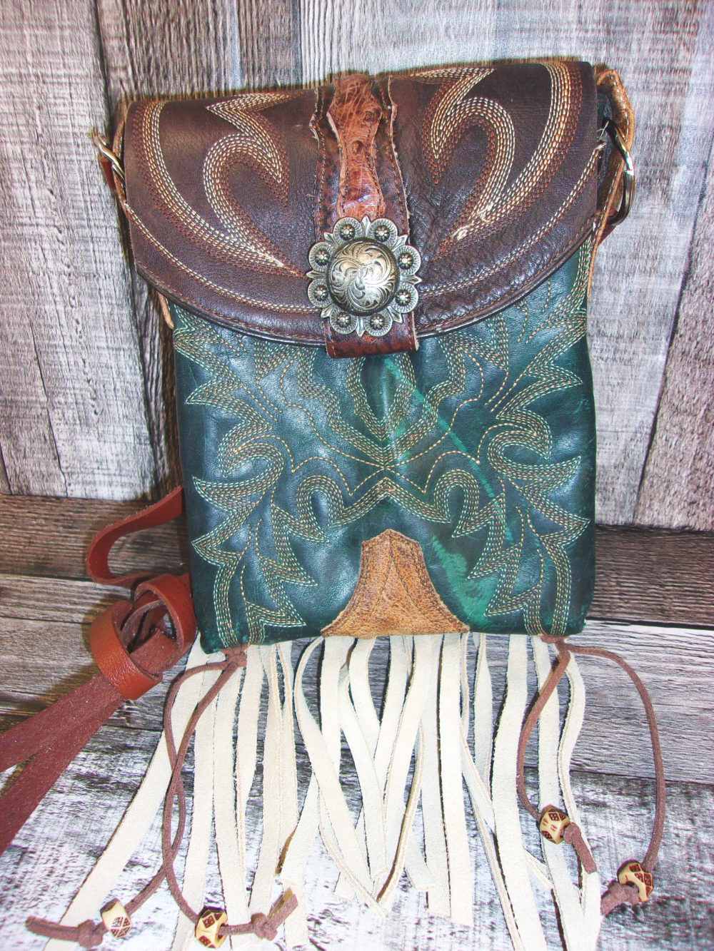 Small Cowboy Boot Purse with Fringe sm133 handcrafted from cowboy boots. Shop all unique leather western handbags, purses and totes at Chris Thompson Bags