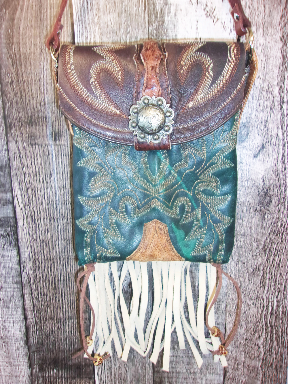 Small Cowboy Boot Purse with Fringe sm133 handcrafted from cowboy boots. Shop all unique leather western handbags, purses and totes at Chris Thompson Bags