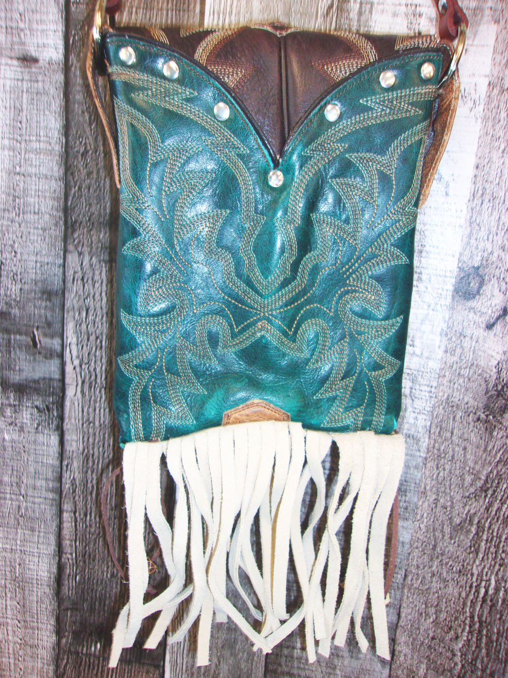 Small Cowboy Boot Purse with Fringe sm133 handcrafted from cowboy boots. Shop all unique leather western handbags, purses and totes at Chris Thompson Bags