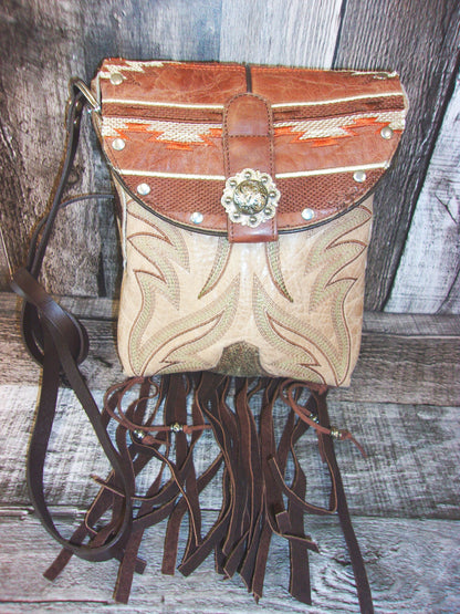 Small Cowboy Boot Purse with Fringe sm232 handcrafted from cowboy boots. Shop all unique leather western handbags, purses and totes at Chris Thompson Bags