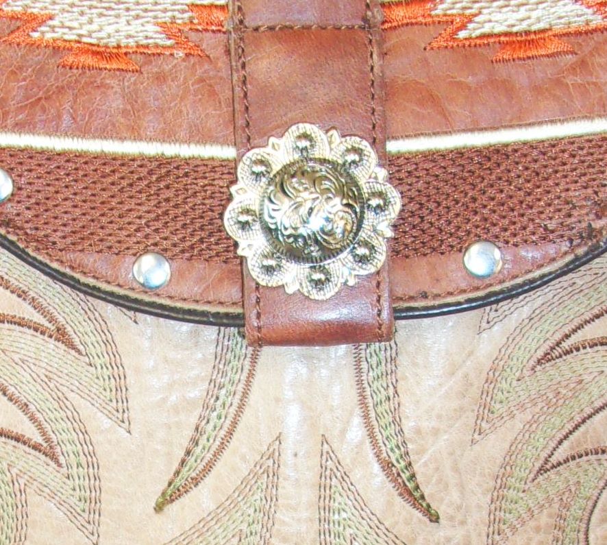 Small Cowboy Boot Purse with Fringe sm232 handcrafted from cowboy boots. Shop all unique leather western handbags, purses and totes at Chris Thompson Bags