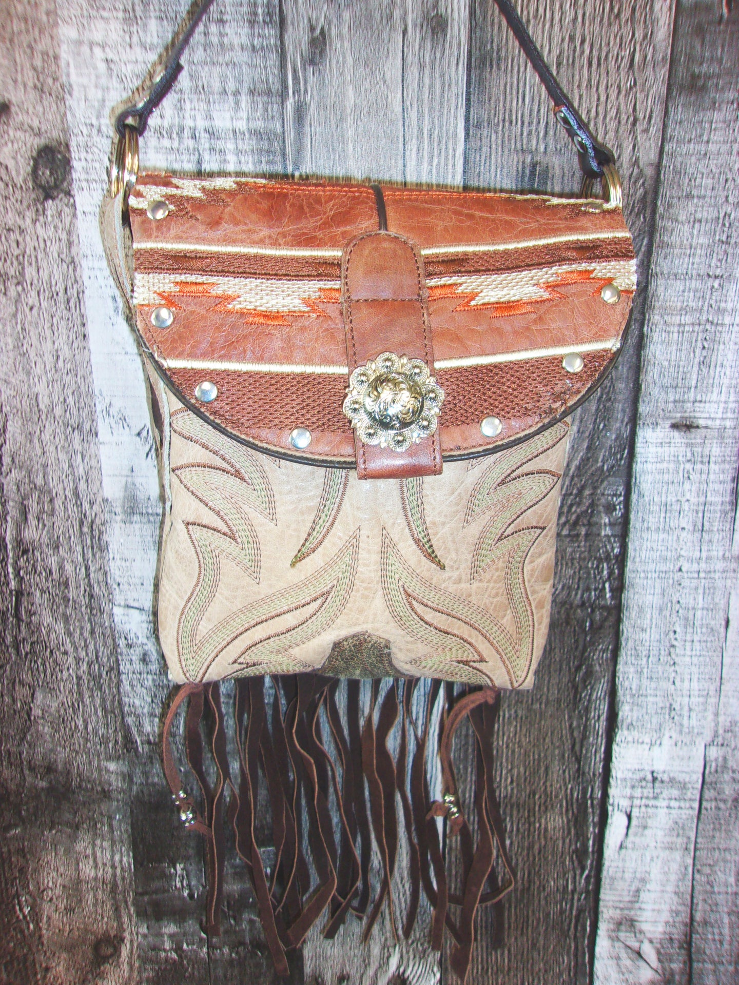 Small Cowboy Boot Purse with Fringe sm232 handcrafted from cowboy boots. Shop all unique leather western handbags, purses and totes at Chris Thompson Bags