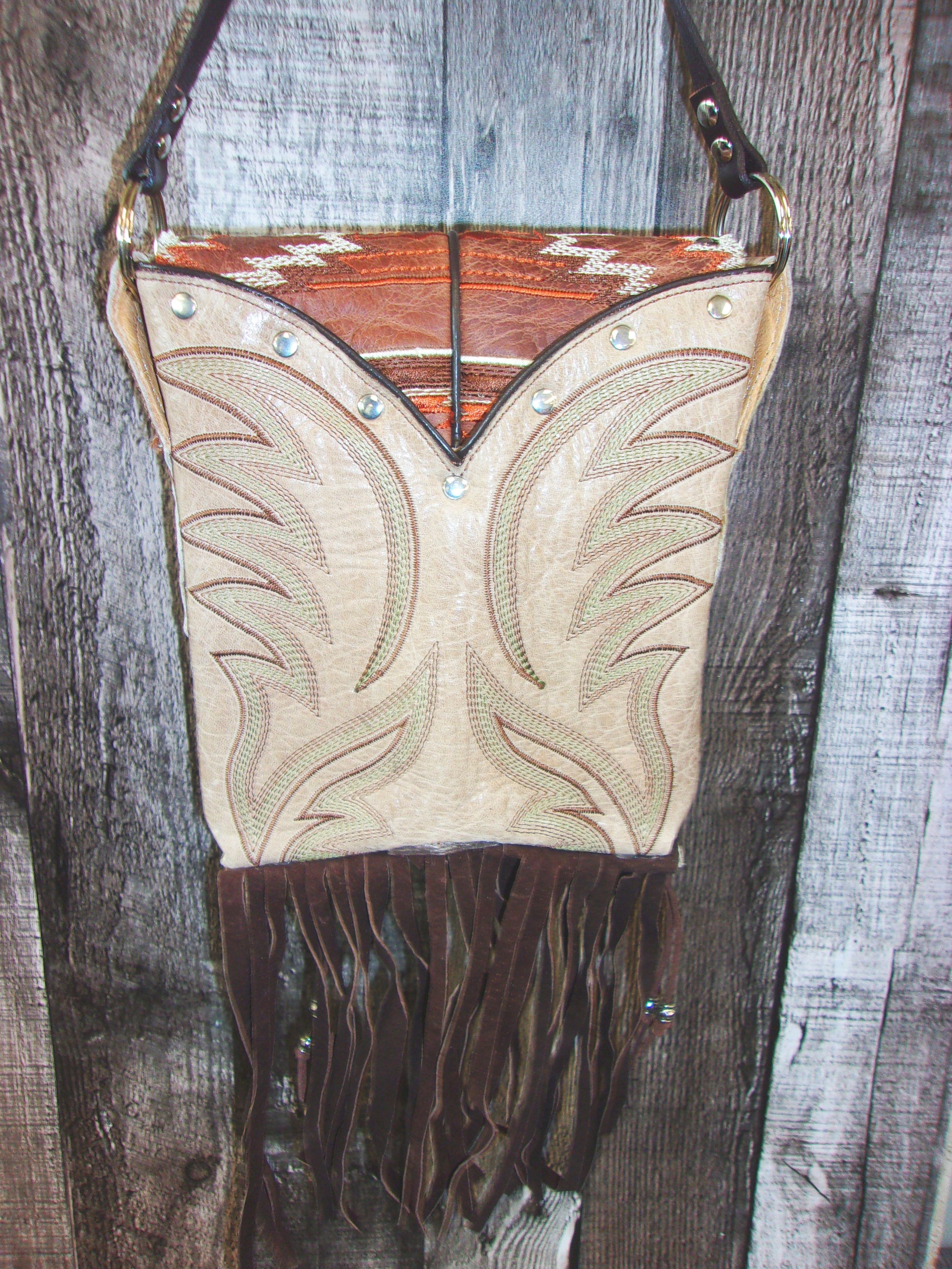 Small Cowboy Boot Purse with Fringe sm232 handcrafted from cowboy boots. Shop all unique leather western handbags, purses and totes at Chris Thompson Bags