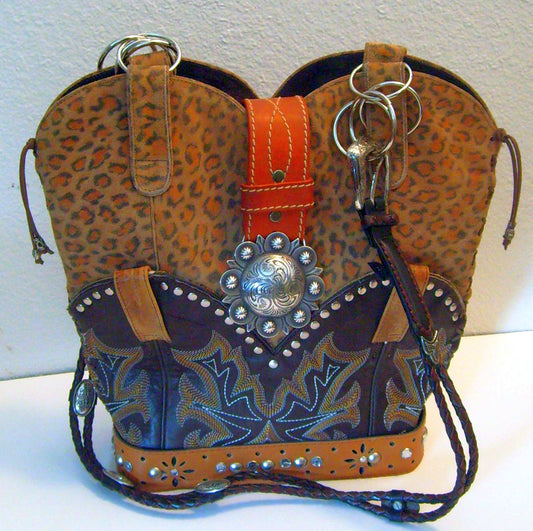 Leopard print handbag with decorative elements on a white background