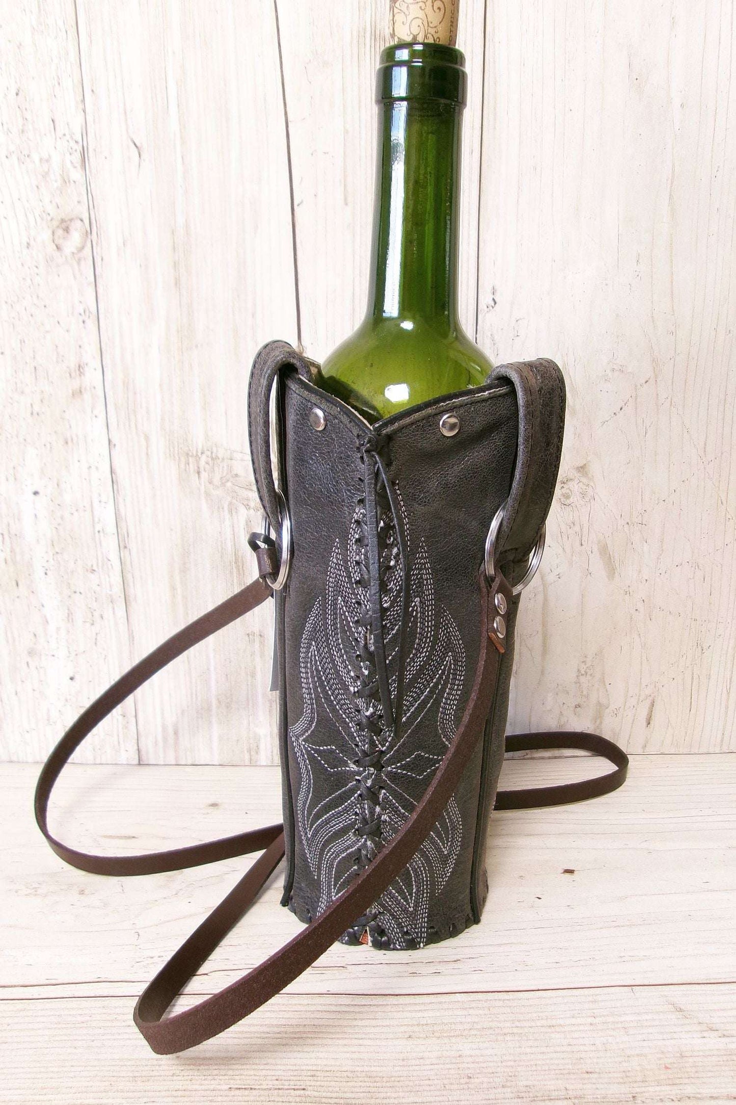 Cowboy Boot Wine Water Tote WA53 handcrafted from cowboy boots. Shop Wine Carrier Bags at ChrisThompsonBags.com and buy the best ["Bottle","Caddy","Crossbody","Holder","Tote","Water","Wine"] at Chris Thompson Bags.